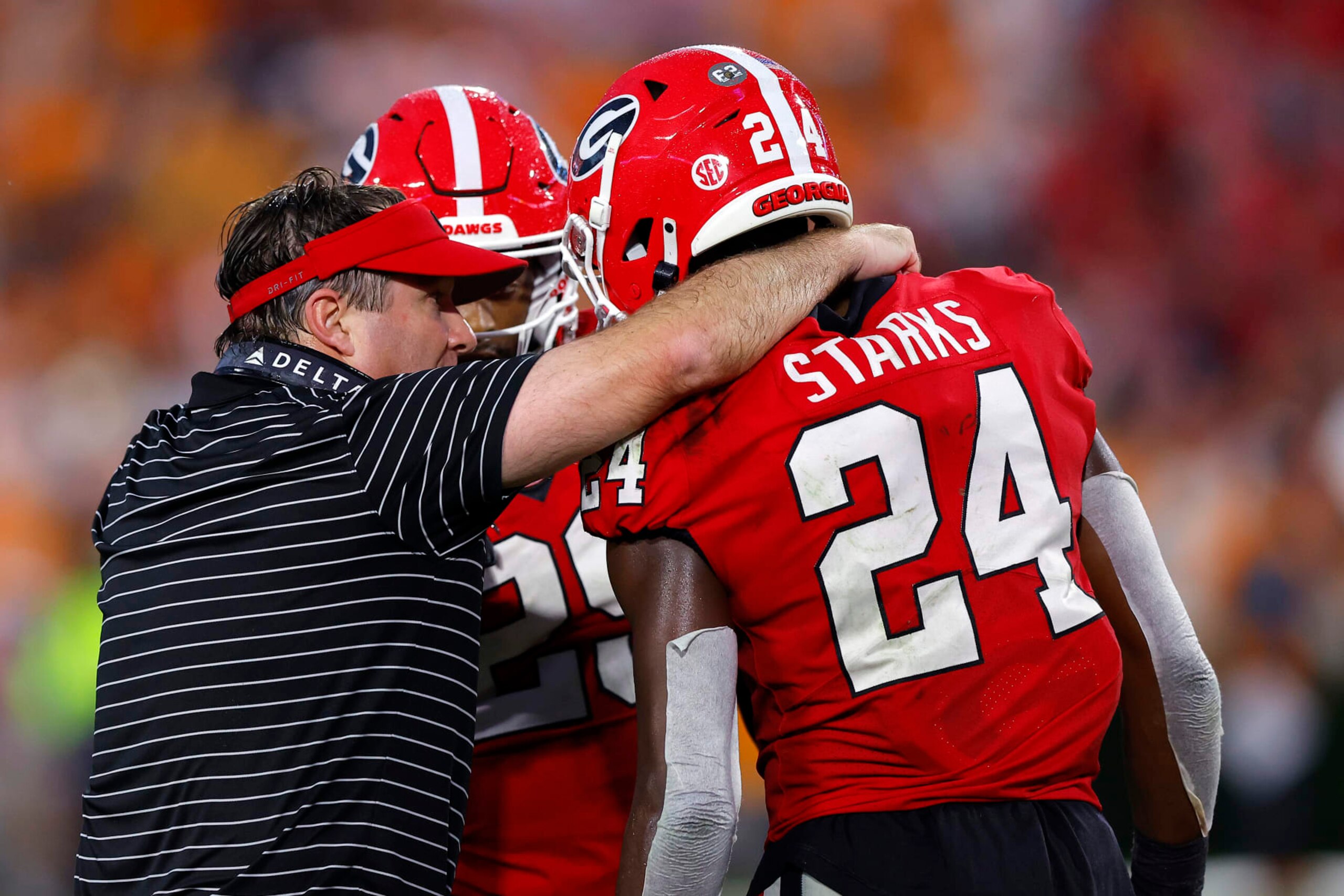 ATHENS, GEORGIA - NOVEMBER 05: Head coach Kirby Smart of the Georgia Bulldogs talks with Malaki Starks #24 of the Georgia Bulldogs during the fourth quarter against the Tennessee Volunteers at Sanford Stadium on November 05, 2022 in Athens, Georgia. (Photo by Todd Kirkland/Getty Images) ATHENS, GEORGIA - NOVEMBER 05: Head coach Kirby Smart of the Georgia Bulldogs talks with Malaki Starks #24 of the Georgia Bulldogs during the fourth quarter against the Tennessee Volunteers at Sanford Stadium on November 05, 2022 in Athens, Georgia. (Photo by Todd Kirkland/Getty Images)