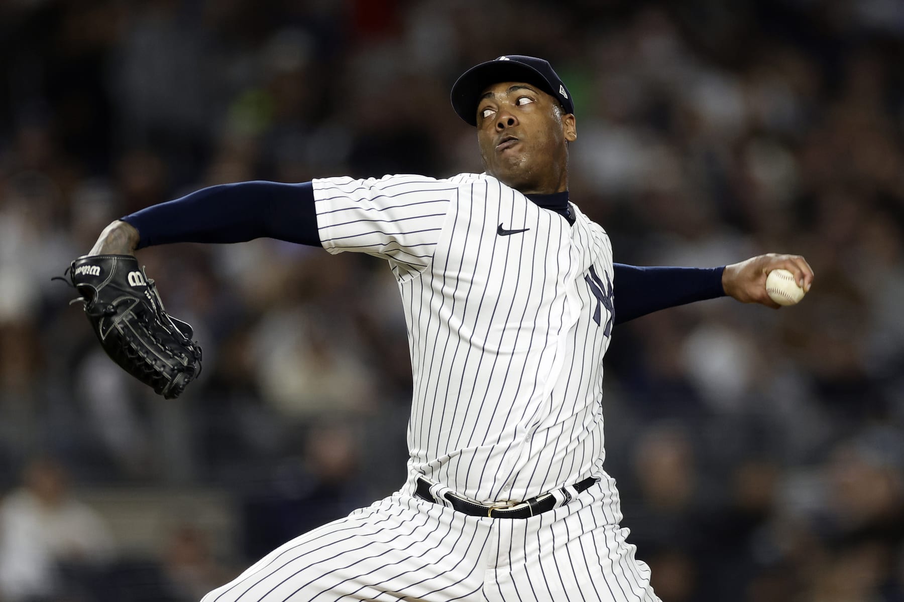 New York Yankees pitcher Aroldis Chapman throws during the eighth inning of a baseball game against the Baltimore Orioles on Friday, Sept. 30, 2022, in New York. (AP Photo/Adam Hunger)