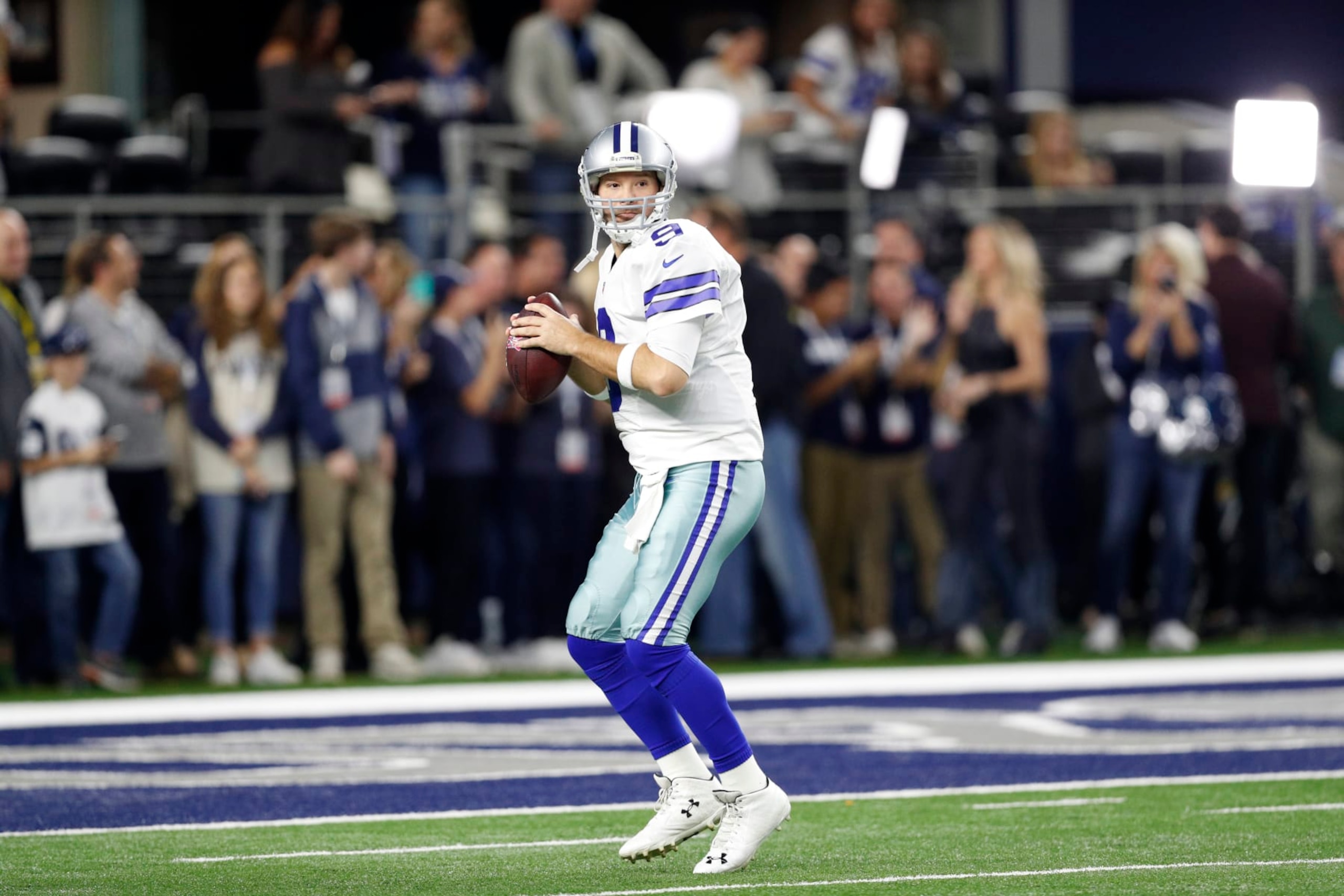 Dallas Cowboys' Tony Romo prepares to throw a pass during warm ups before an NFL football game against the Detroit Lions on Monday, Dec. 26, 2016, in Arlington, Texas. (AP Photo/Brandon Wade)