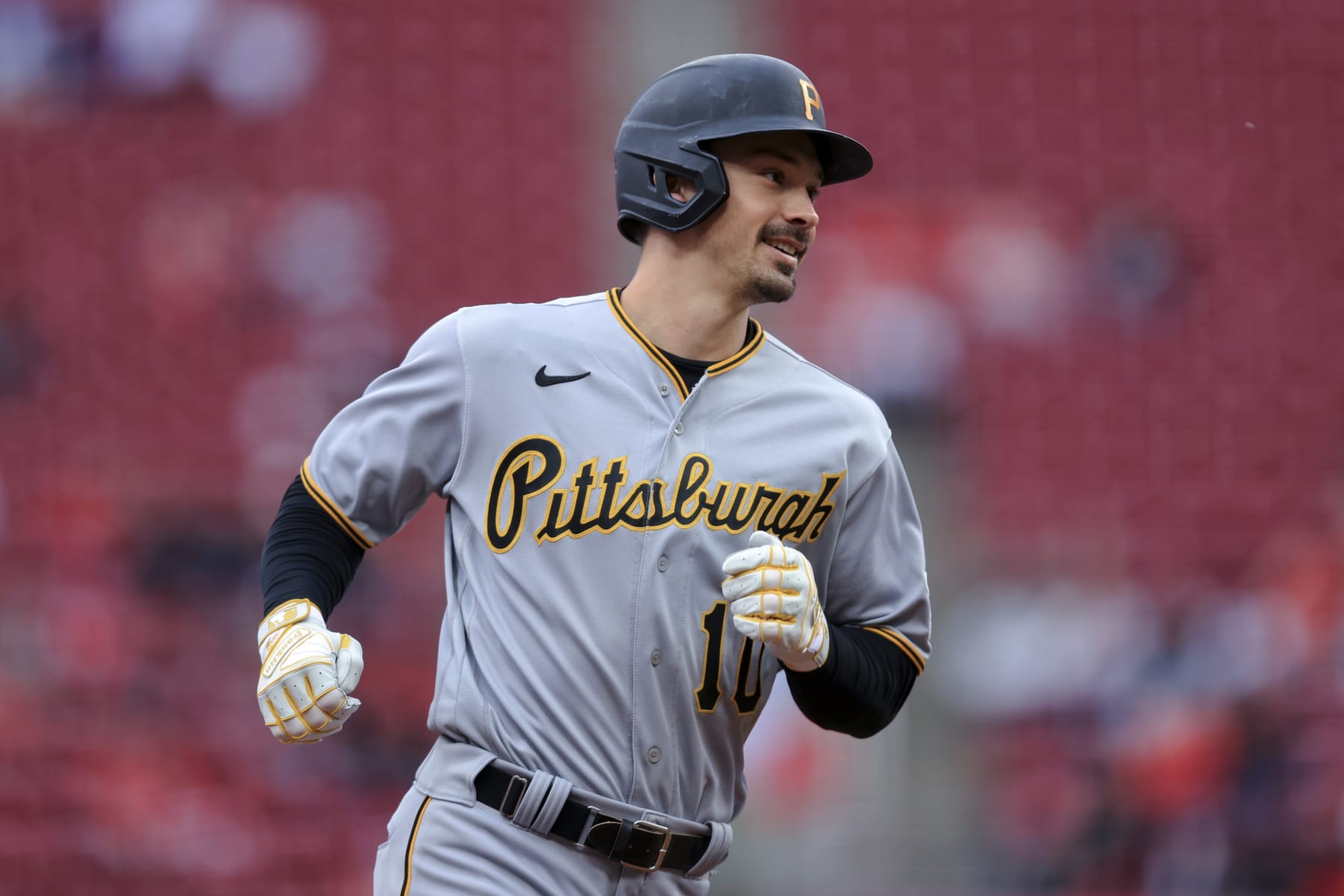 Pittsburgh Pirates' Bryan Reynolds runs the bases after hitting a solo home run during the first inning against the Cincinnati Reds in the second baseball game of a doubleheader in Cincinnati, Saturday, May 7, 2022. (AP Photo/Aaron Doster)