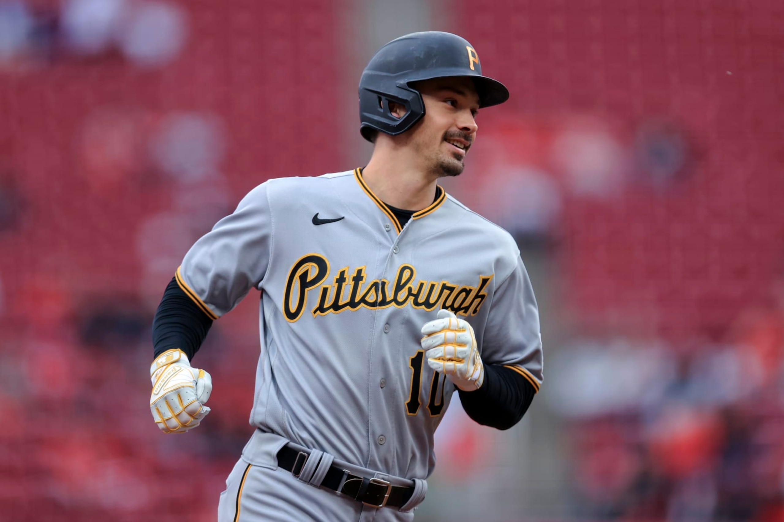 Pittsburgh Pirates' Bryan Reynolds runs the bases after hitting a solo home run during the first inning against the Cincinnati Reds in the second baseball game of a doubleheader in Cincinnati, Saturday, May 7, 2022. (AP Photo/Aaron Doster)