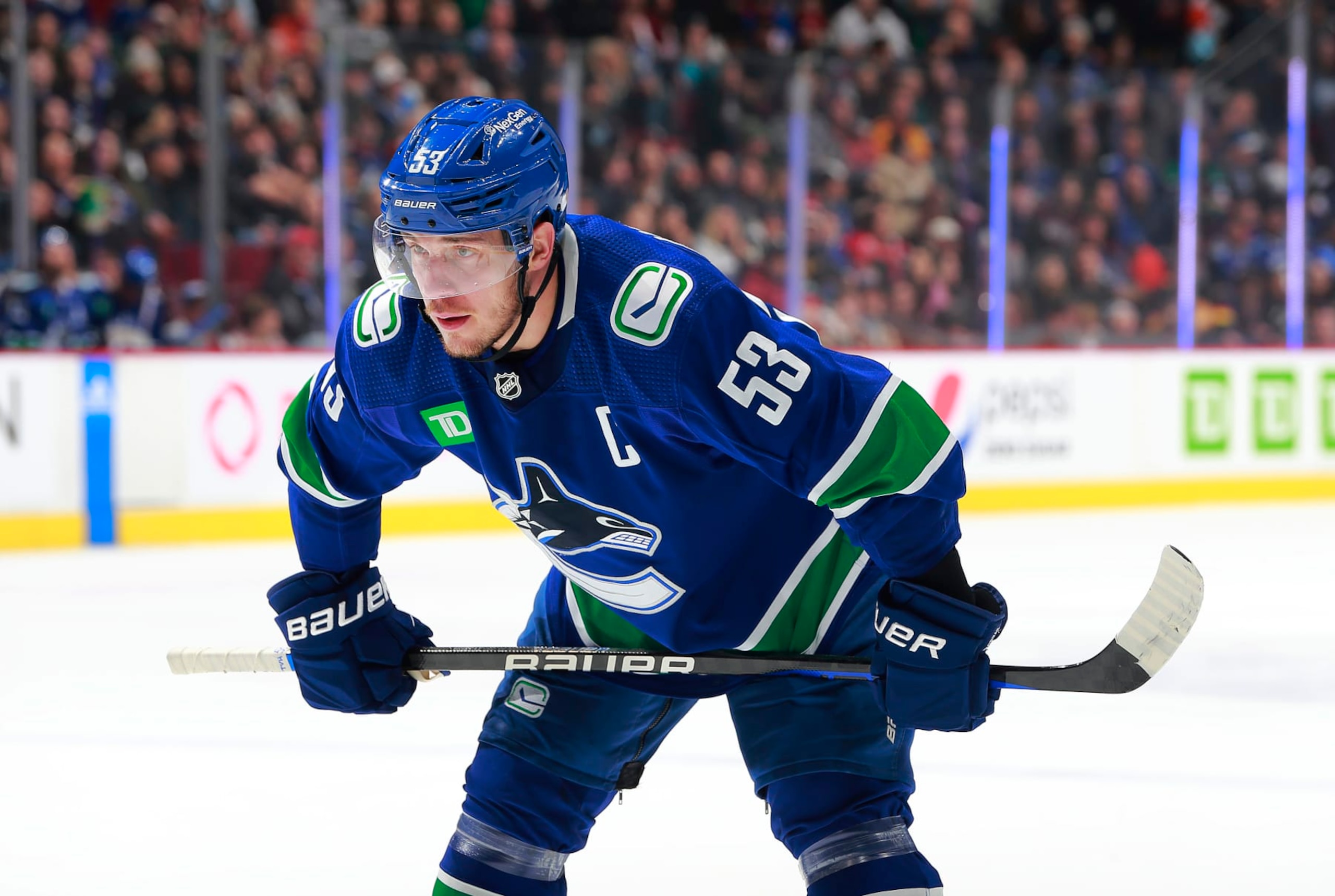 VANCOUVER, CANADA - JANUARY 3: Bo Horvat #53 of the Vancouver Canucks lines up for a face-off during their NHL game against the New York Islanders at Rogers Arena January 3, 2023 in Vancouver, British Columbia, Canada.  (Photo by Jeff Vinnick/NHLI via Getty Images)
