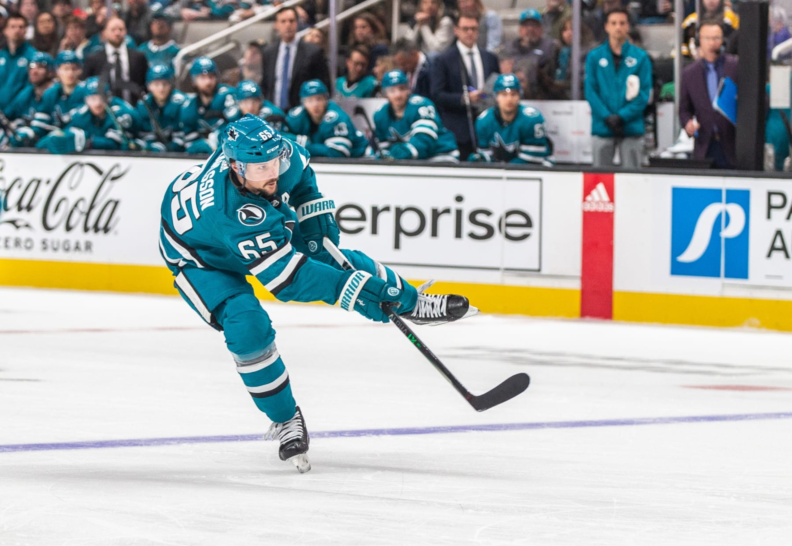 SAN JOSE, CA - JANUARY 07: San Jose Sharks Defenceman Erik Karlsson (65) takes a shot during the third period of a regular season NHL hockey game between the Boston Bruins and the San Jose Sharks on January 7, 2023, at SAP Center, in San Jose, CA. (Photo by Tony Ding/Icon Sportswire via Getty Images)