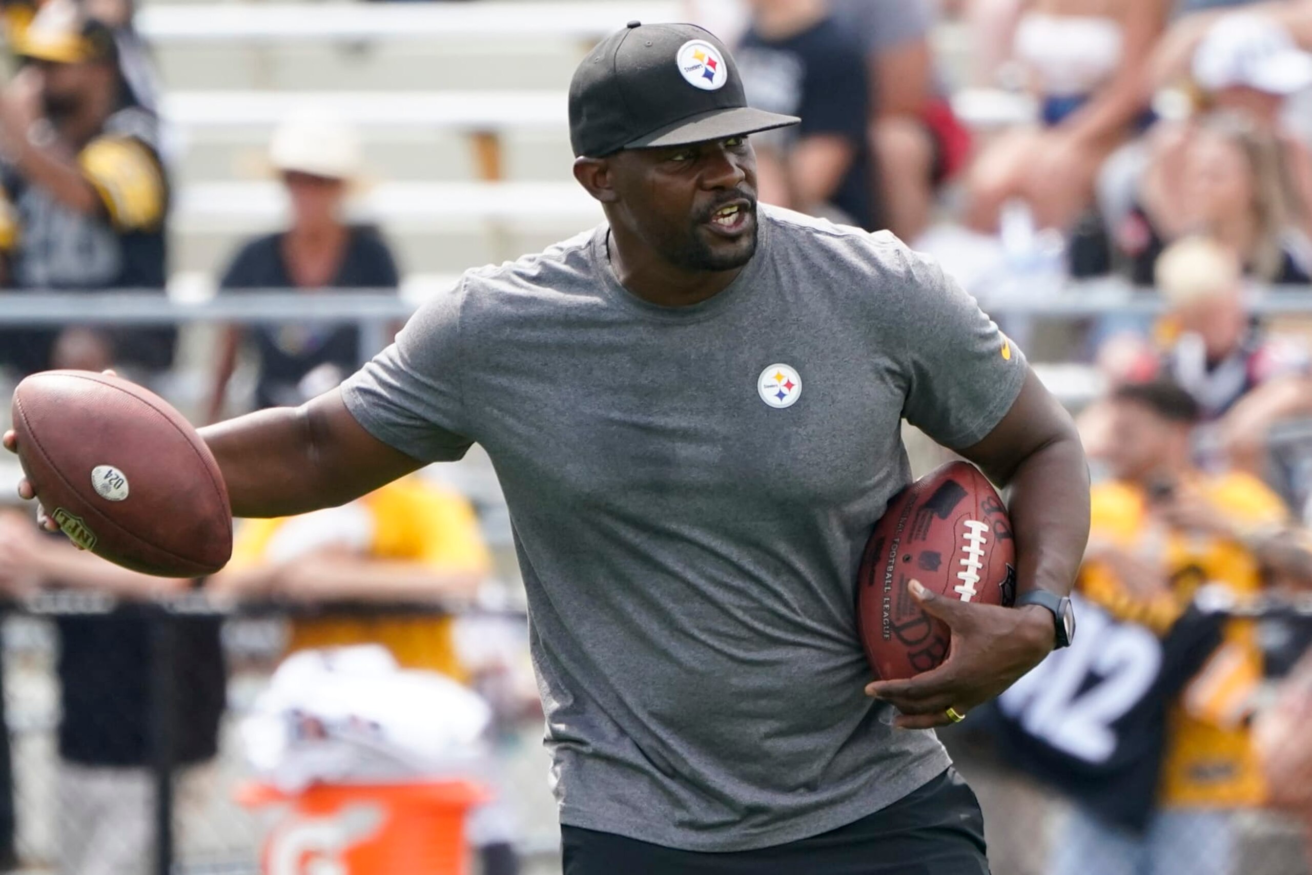Pittsburgh Steelers senior defensive assistant Brian Flores works with the defense as they go through drills during practice at NFL football training camp in the Latrobe Memorial Stadium in Latrobe, Pa., Monday, Aug. 8, 2022. (AP Photo/Keith Srakocic)