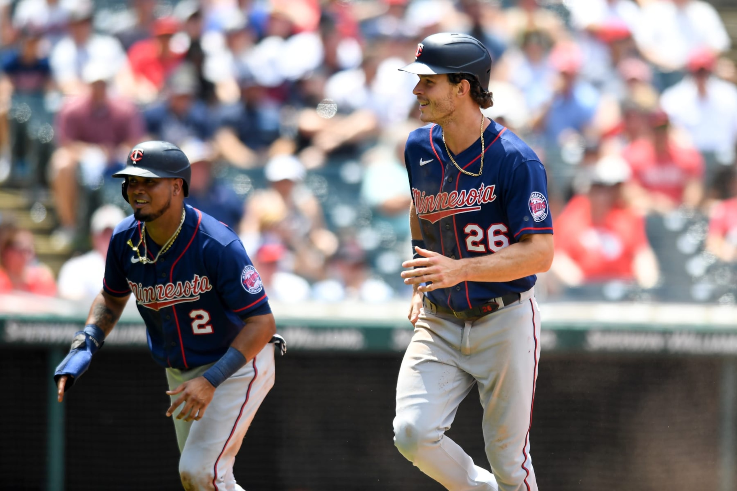 CLEVELAND, OH - JUNE 30: Luis Arráez #2 and Max Kepler #26 of the Minnesota Twins celebrate scoring on a three-run double by José Miranda during the third inning against the Cleveland Guardians at Progressive Field on June 30, 2022 in Cleveland, Ohio. (Photo by Nick Cammett/Diamond Images via Getty Images)