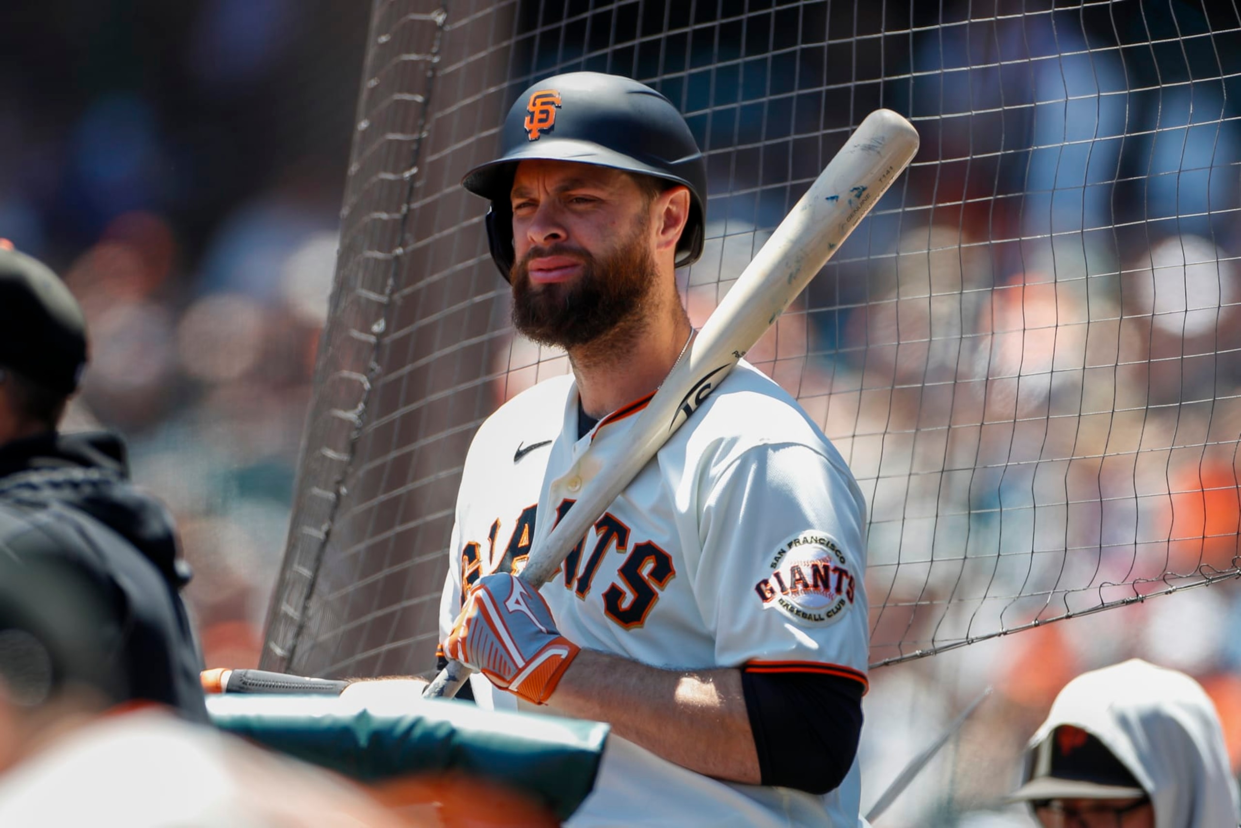 SAN FRANCISCO, CA - JUNE 15: San Francisco Giants designated hitter Brandon Belt (9) waits in the dugout with his bat during a regular season game between the Kansas City Royals and San Francisco Giants on June 15, 2022, at Oracle Park in San Francisco, CA. (Photo by Brandon Sloter/Icon Sportswire via Getty Images)