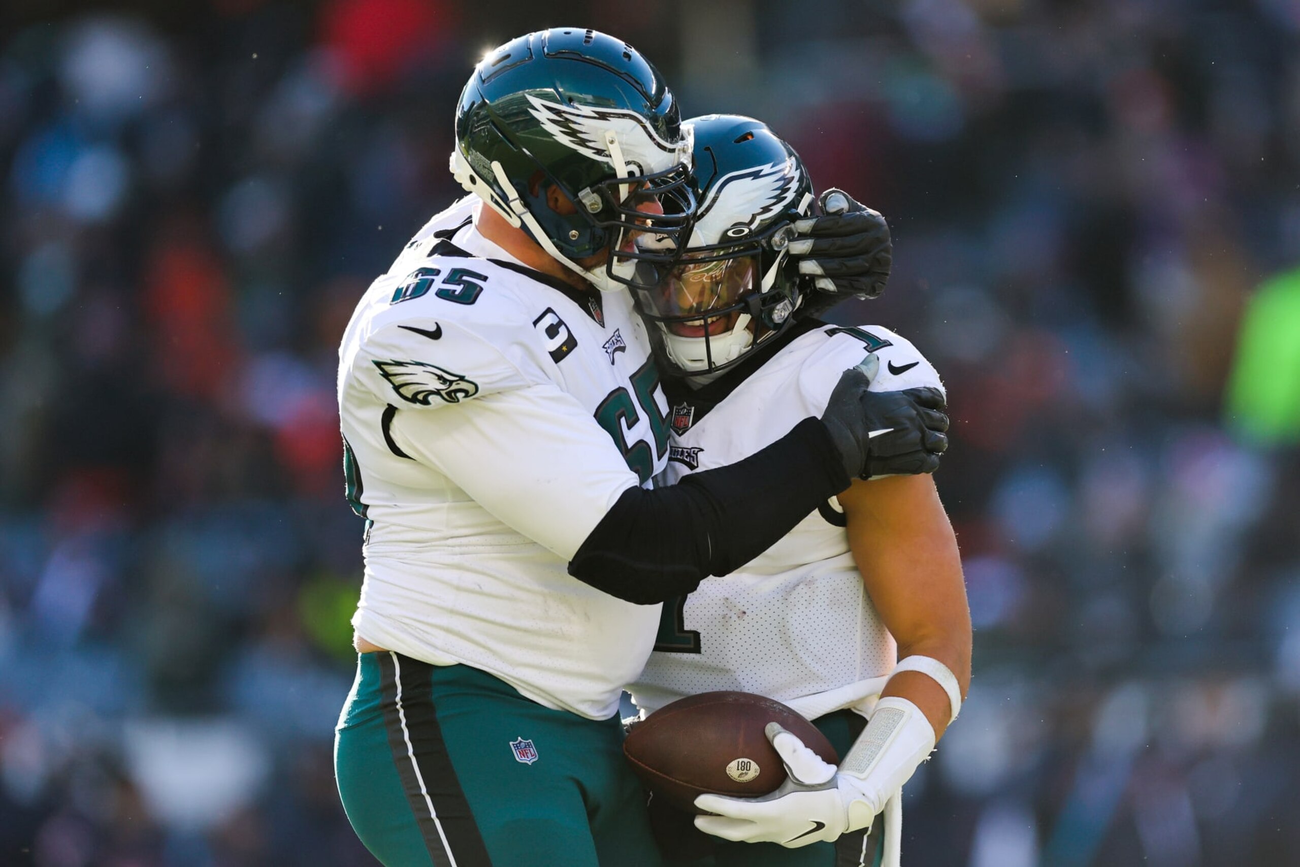 CHICAGO, ILLINOIS - DECEMBER 18: Jalen Hurts #1 of the Philadelphia Eagles celebrates a touchdown during the third quarter with Lane Johnson #65 in the game against the Chicago Bears at Soldier Field on December 18, 2022 in Chicago, Illinois. (Photo by Michael Reaves/Getty Images)