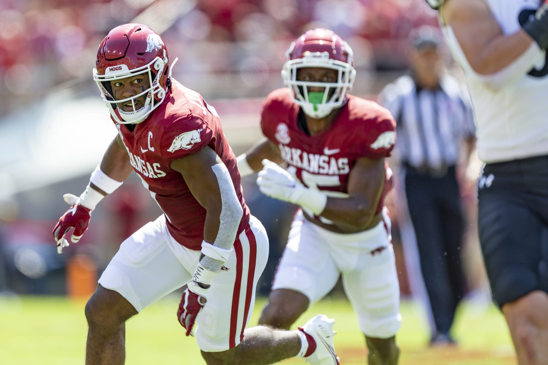 Jalen Catalon of the Arkansas Razorbacks (foreground)