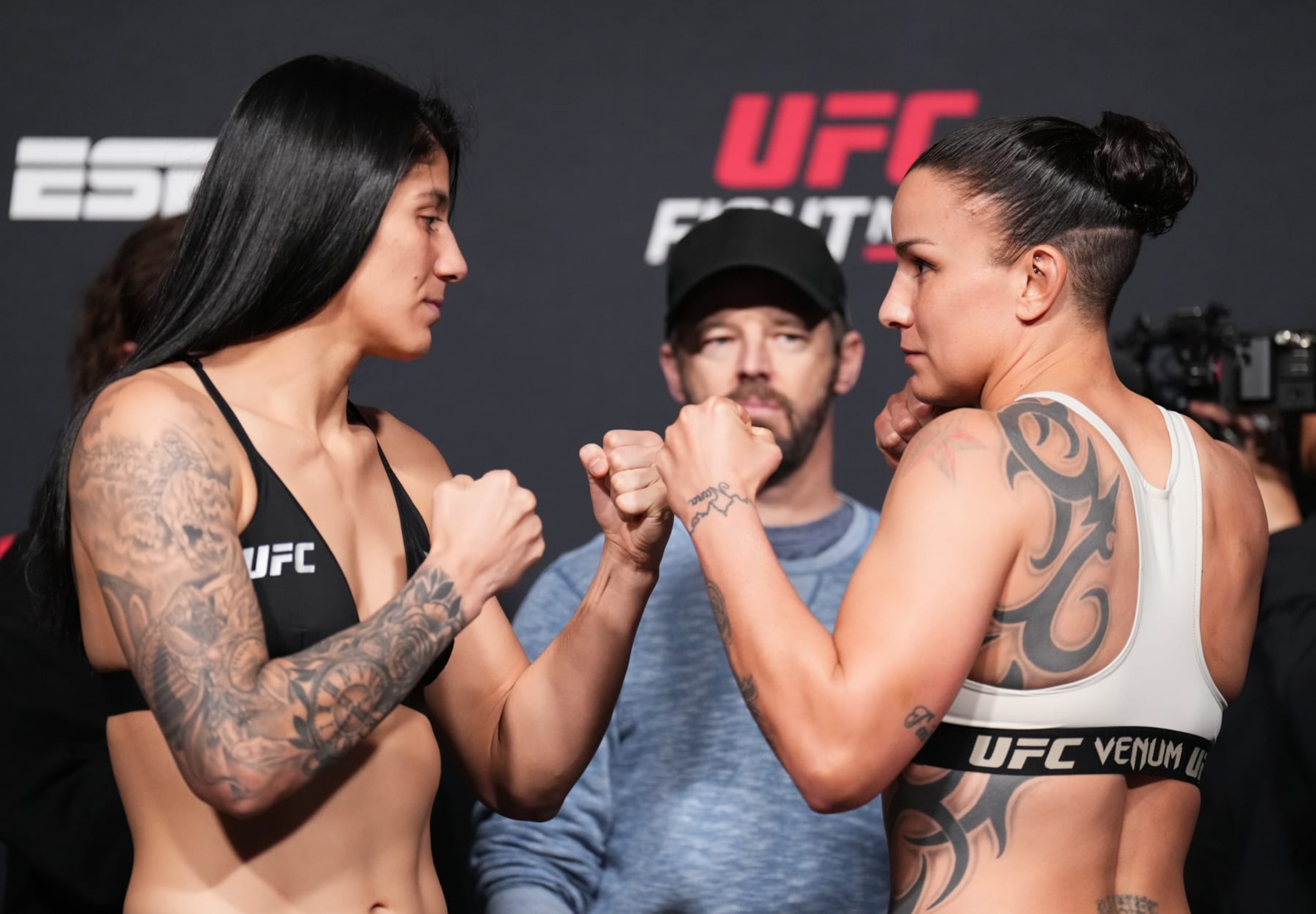 LAS VEGAS, NEVADA - JANUARY 13: (L-R) Opponents Ketlen Vieira of Brazil and Raquel Pennington face off during the UFC weigh-in at UFC APEX on January 13, 2023 in Las Vegas, Nevada. (Photo by Chris Unger/Zuffa LLC via Getty Images)