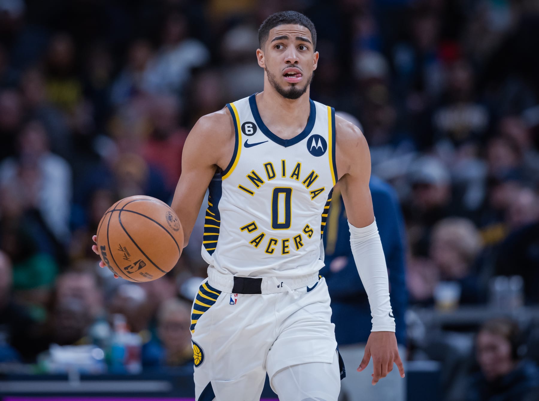 INDIANAPOLIS, IN - JANUARY 08: Tyrese Haliburton #0 of the Indiana Pacers brings the ball up court during the game against the Charlotte Hornets at Gainbridge Fieldhouse on January 8, 2023 in Indianapolis, Indiana. NOTE TO USER: User expressly acknowledges and agrees that, by downloading and or using this photograph, User is consenting to the terms and conditions of the Getty Images License Agreement. (Photo by Michael Hickey/Getty Images)