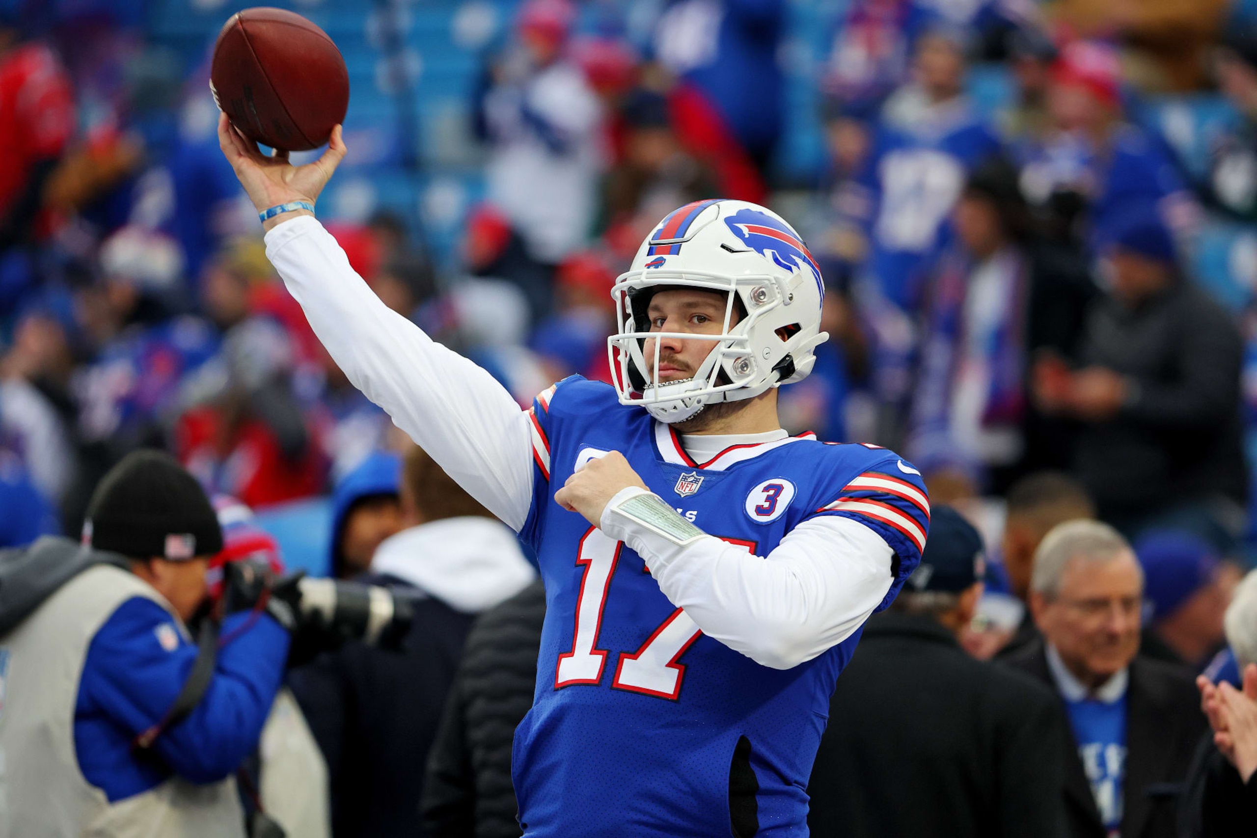 ORCHARD PARK, NEW YORK - JANUARY 08: Josh Allen #17 of the Buffalo Bills warms up prior to a game against the New England Patriots at Highmark Stadium on January 08, 2023 in Orchard Park, New York. (Photo by Timothy T Ludwig/Getty Images)