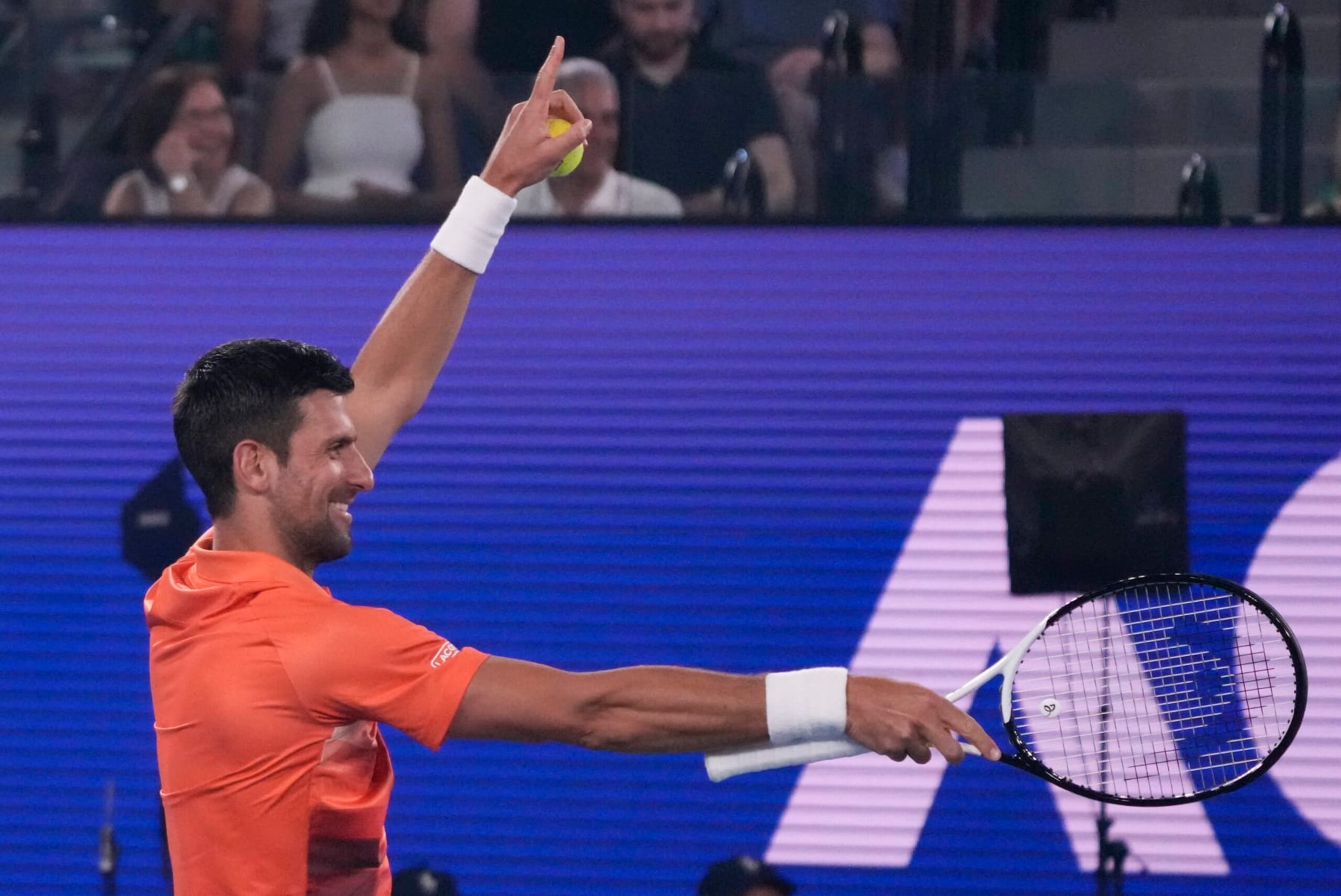 Serbia's Novak Djokovic gestures during an exhibition match against Australia's Nick Kyrgios on Rod Laver Arena ahead of the Australian Open tennis championship in Melbourne, Australia, Friday, Jan. 13, 2023. (AP Photo/Mark Baker)