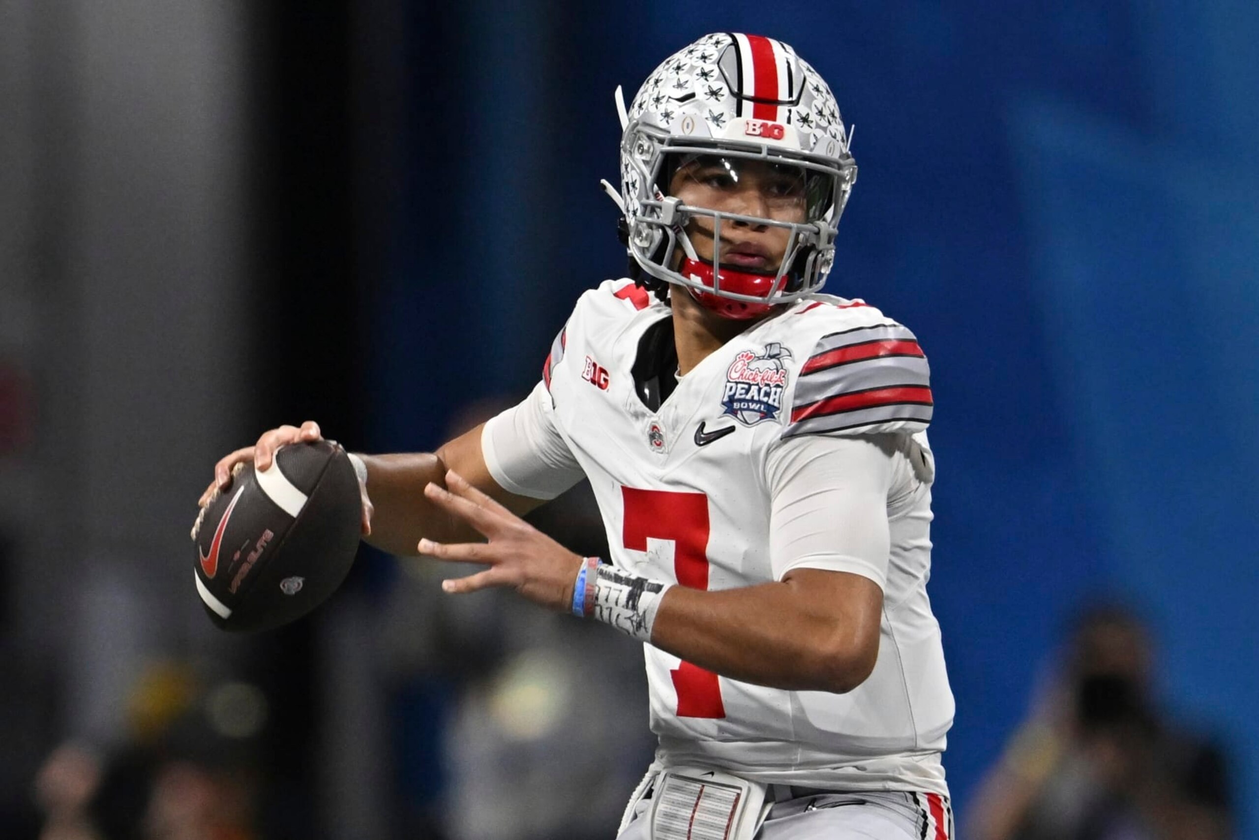 Ohio State quarterback C.J. Stroud (7) passes against Georgia during the first half of the Peach Bowl NCAA college football semifinal playoff game, Saturday, Dec. 31, 2022, in Atlanta. (AP Photo/Danny Karnik)