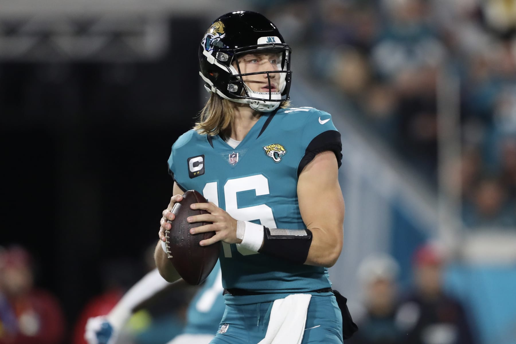 JACKSONVILLE, FLORIDA - JANUARY 07: Trevor Lawrence #16 of the Jacksonville Jaguars drops back to pass during the first half against the Tennessee Titans at TIAA Bank Field on January 07, 2023 in Jacksonville, Florida. (Photo by Courtney Culbreath/Getty Images)