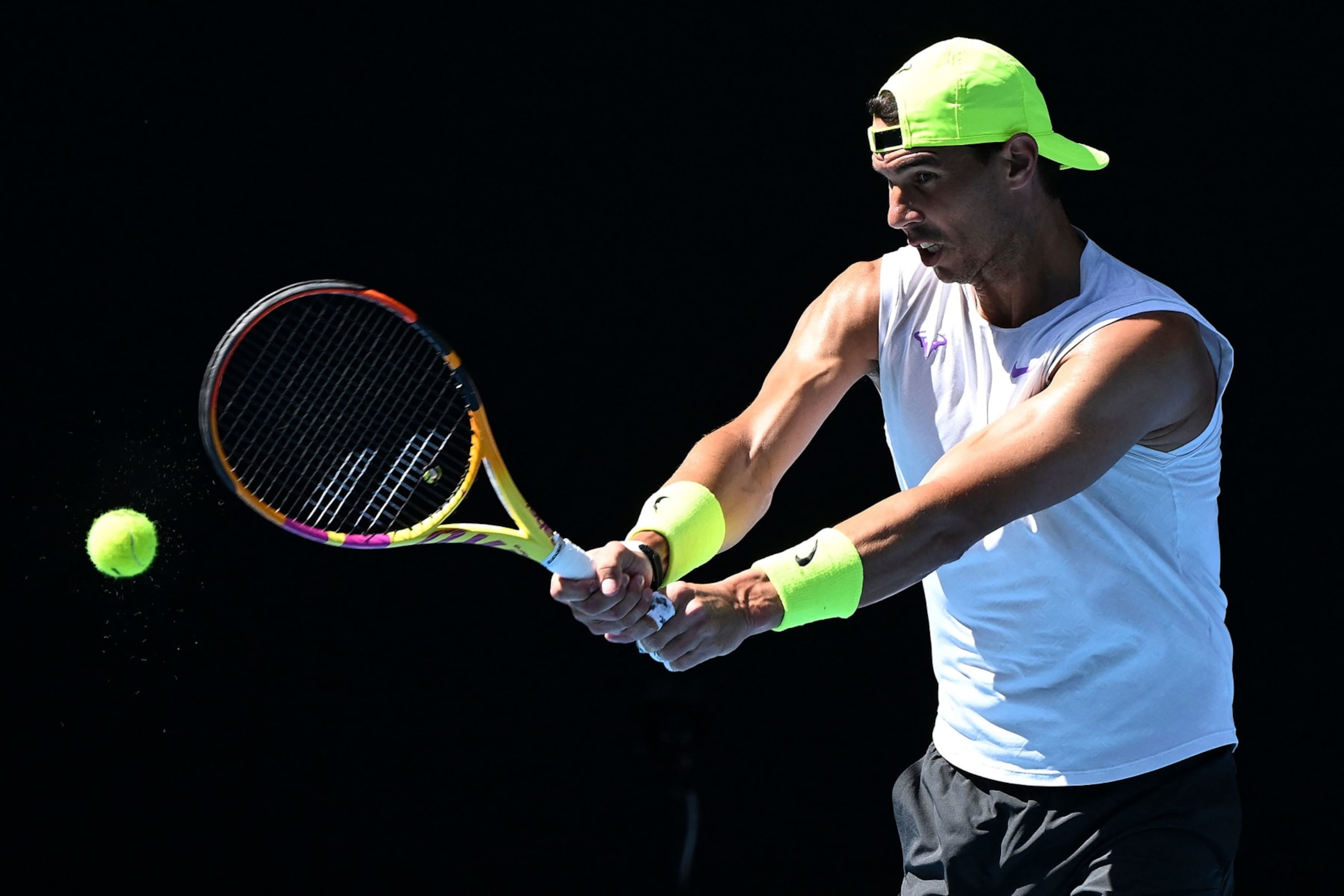 Spain's Rafael Nadal hits a return during a practice session at the Malbourne Park ahead of the Australian Open tennis tournament in Melbourne on January 14, 2023. - --IMAGE RESTRICTED TO EDITORIAL USE - STRICTLY NO COMMERCIAL USE-- (Photo by WILLIAM WEST / AFP) / --IMAGE RESTRICTED TO EDITORIAL USE - STRICTLY NO COMMERCIAL USE-- (Photo by WILLIAM WEST/AFP via Getty Images) Spain's Rafael Nadal hits a return during a practice session at the Malbourne Park ahead of the Australian Open tennis tournament in Melbourne on January 14, 2023. - --IMAGE RESTRICTED TO EDITORIAL USE - STRICTLY NO COMMERCIAL USE-- (Photo by WILLIAM WEST / AFP) / --IMAGE RESTRICTED TO EDITORIAL USE - STRICTLY NO COMMERCIAL USE-- (Photo by WILLIAM WEST/AFP via Getty Images)