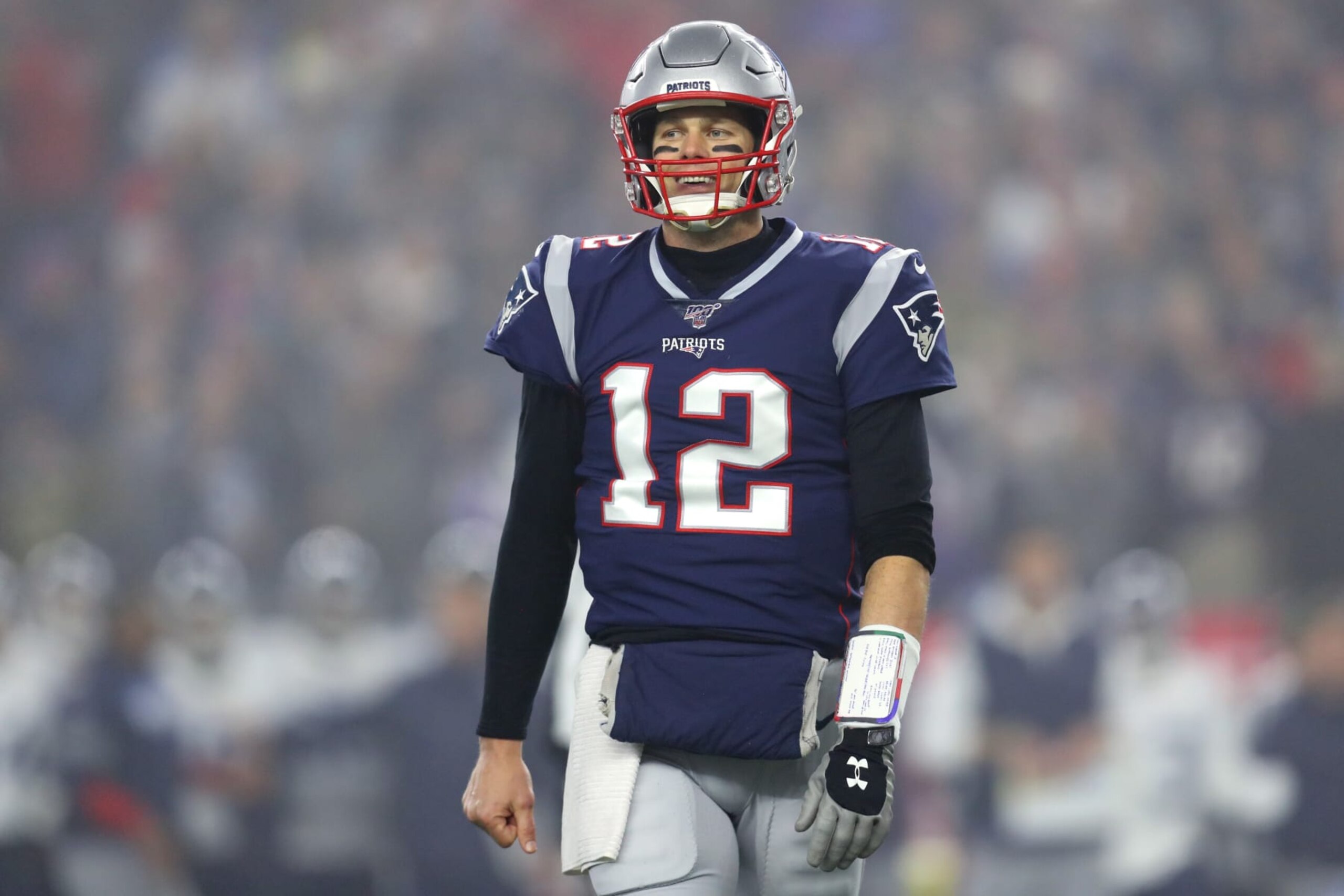 FOXBOROUGH, MASSACHUSETTS - JANUARY 04: Tom Brady #12 of the New England Patriots reacts during the the AFC Wild Card Playoff game against the Tennessee Titans at Gillette Stadium on January 04, 2020 in Foxborough, Massachusetts. (Photo by Maddie Meyer/Getty Images)