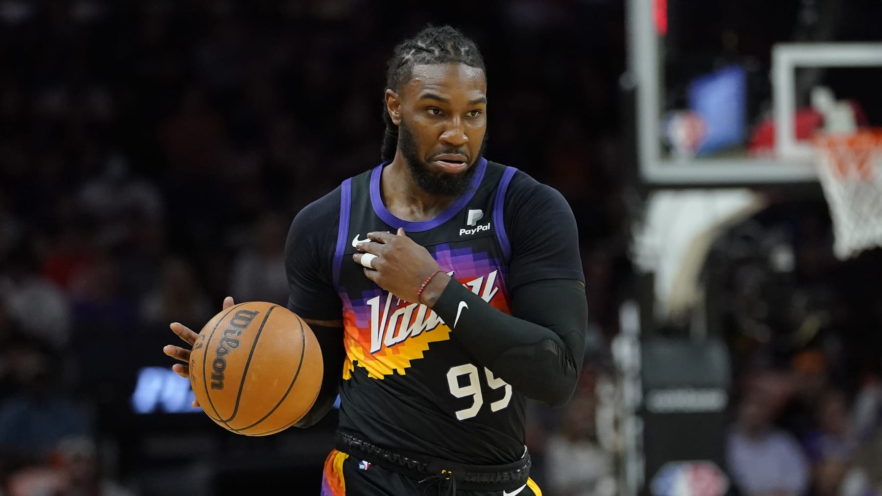 Phoenix Suns forward Jae Crowder (99) looks to pass against the New Orleans Pelicans during the first half of Game 5 of an NBA basketball first-round playoff series, Tuesday, April 26, 2022, in Phoenix. (AP Photo/Matt York)