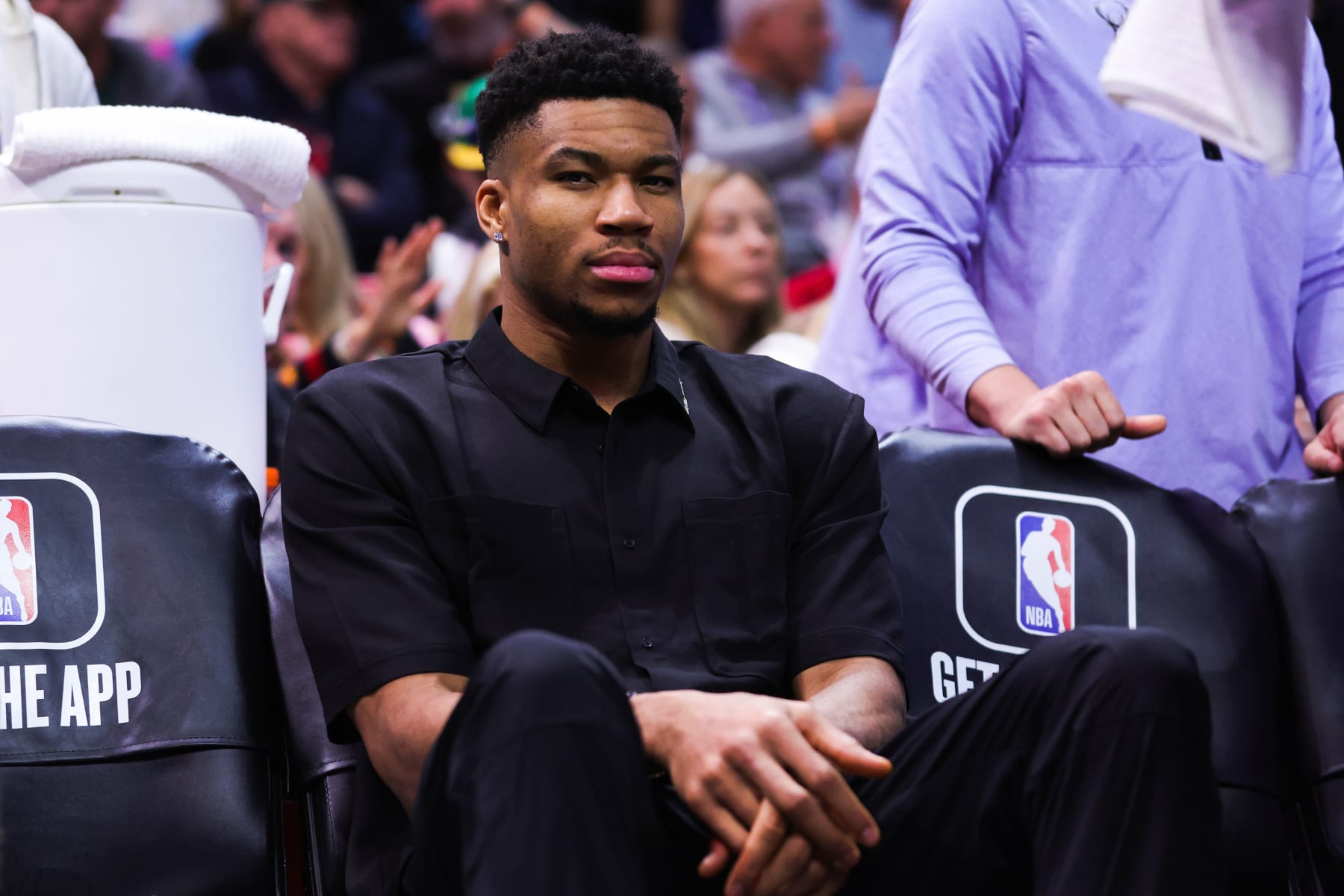MIAMI, FLORIDA - JANUARY 14: Giannis Antetokounmpo #34 of the Milwaukee Bucks looks on from the bench during the second quarter of the game against the Miami Heat at Miami-Dade Arena on January 14, 2023 in Miami, Florida. NOTE TO USER: User expressly acknowledges and agrees that, by downloading and or using this photograph, User is consenting to the terms and conditions of the Getty Images License Agreement. (Photo by Megan Briggs/Getty Images)