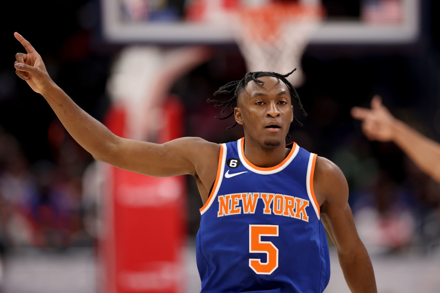 WASHINGTON, DC - JANUARY 13: Immanuel Quickley #5 of the New York Knicks reacts after scoring against the Washington Wizards in the first half at Capital One Arena on January 13, 2023 in Washington, DC. NOTE TO USER: User expressly acknowledges and agrees that, by downloading and or using this photograph, User is consenting to the terms and conditions of the Getty Images License Agreement.  (Photo by Rob Carr/Getty Images)