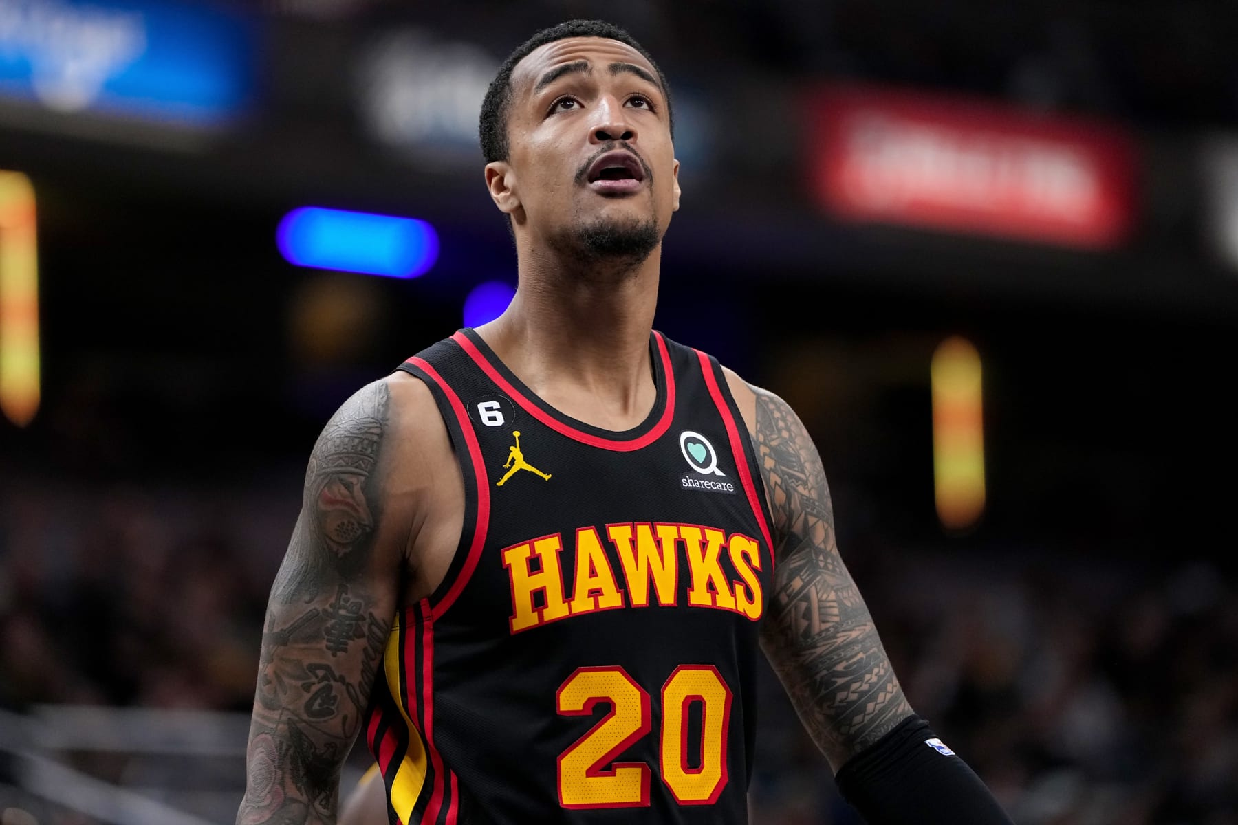 INDIANAPOLIS, INDIANA - JANUARY 13: John Collins #20 of the Atlanta Hawks looks on in the fourth quarter against the Indiana Pacers at Gainbridge Fieldhouse on January 13, 2023 in Indianapolis, Indiana. NOTE TO USER: User expressly acknowledges and agrees that, by downloading and or using this photograph, User is consenting to the terms and conditions of the Getty Images License Agreement. (Photo by Dylan Buell/Getty Images)