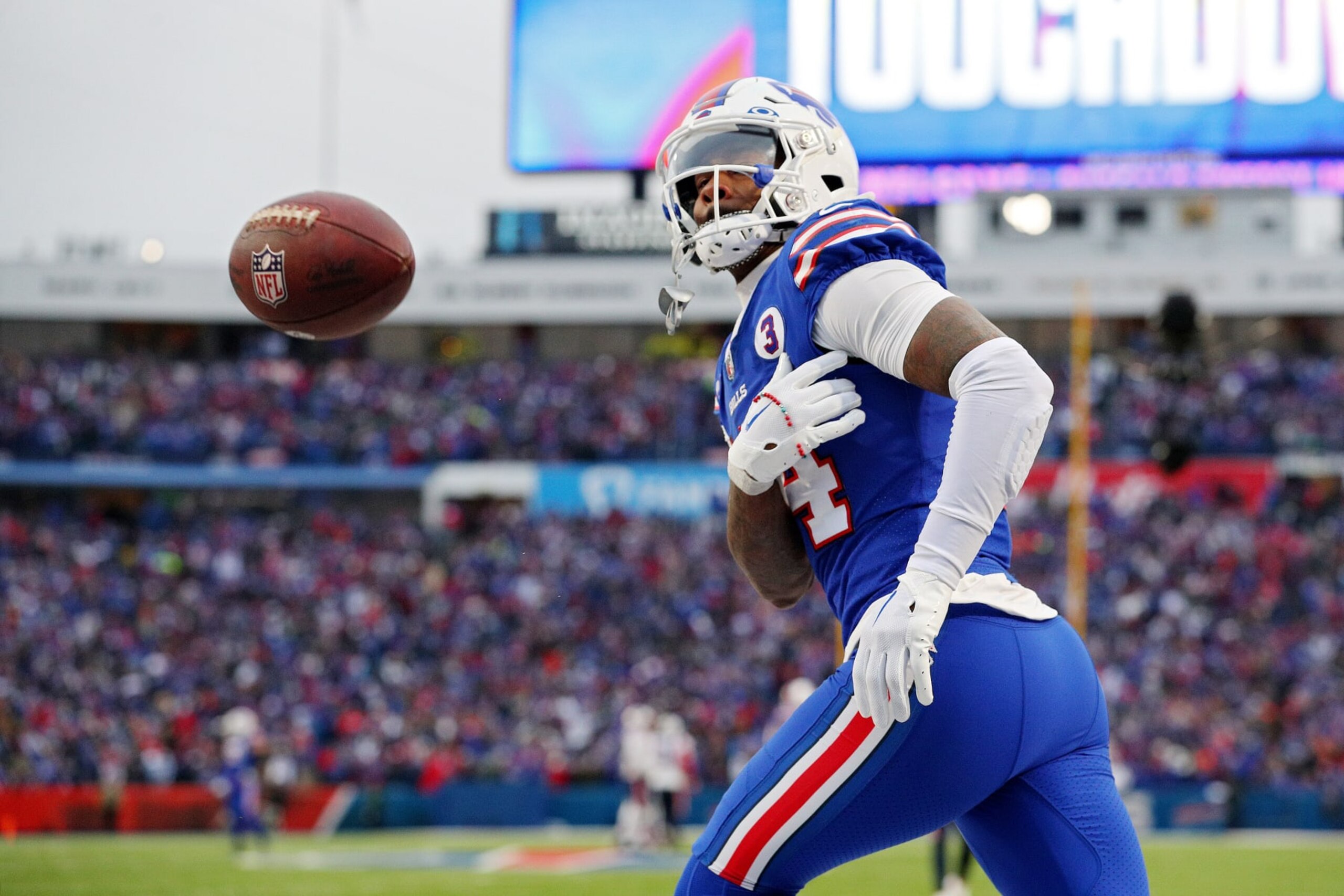 ORCHARD PARK, NEW YORK - JANUARY 08: Stefon Diggs #14 of the Buffalo Bills celebrates after catching a touchdown  during the fourth quarter against the New England Patriots at Highmark Stadium on January 08, 2023 in Orchard Park, New York. (Photo by Bryan M. Bennett/Getty Images)