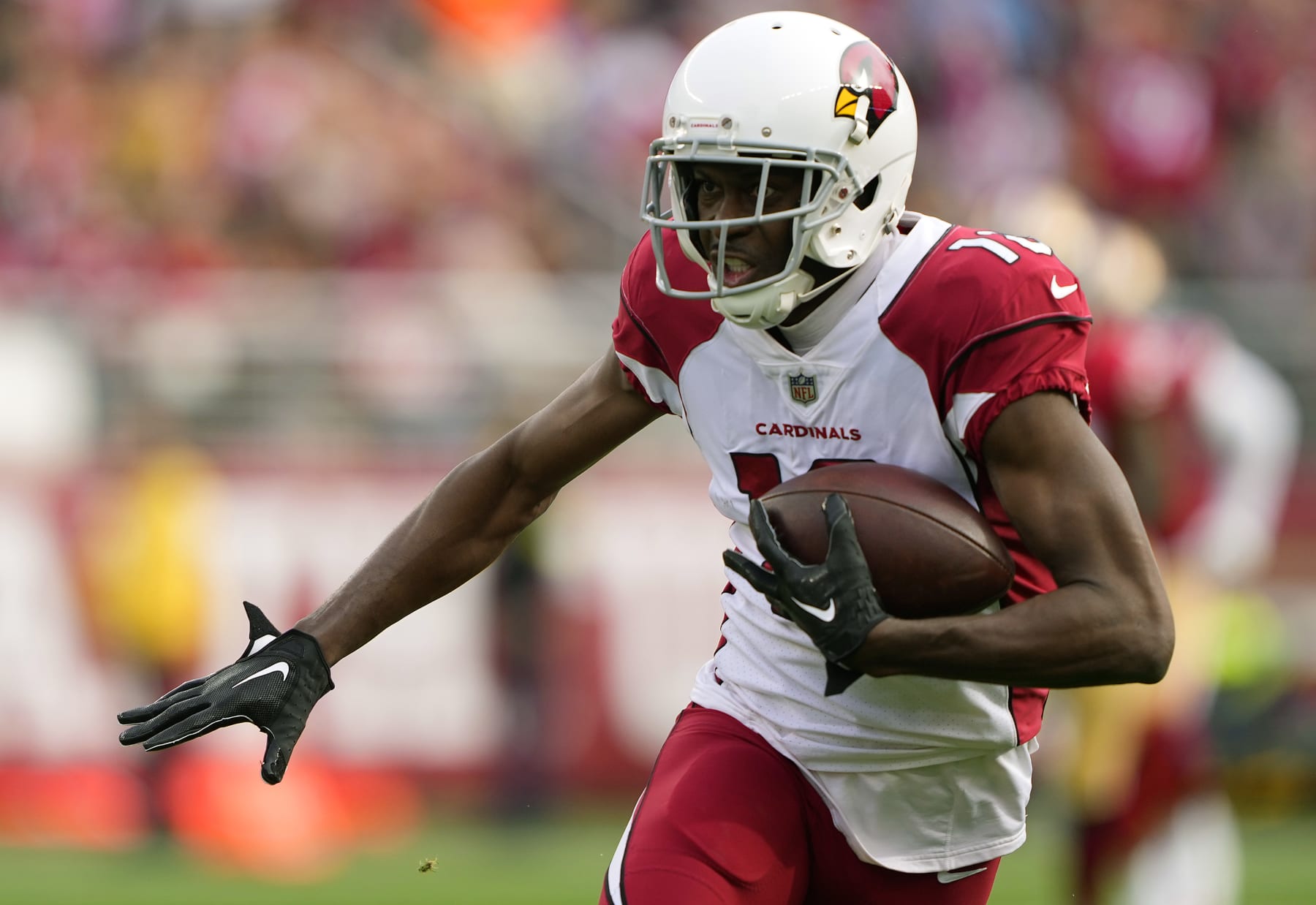 SANTA CLARA, CALIFORNIA - JANUARY 08: A.J. Green #18 of the Arizona Cardinals catches a pass and runs the ball for a touchdown during the first quarter against the San Francisco 49ers at Levi's Stadium on January 08, 2023 in Santa Clara, California. (Photo by Thearon W. Henderson/Getty Images)