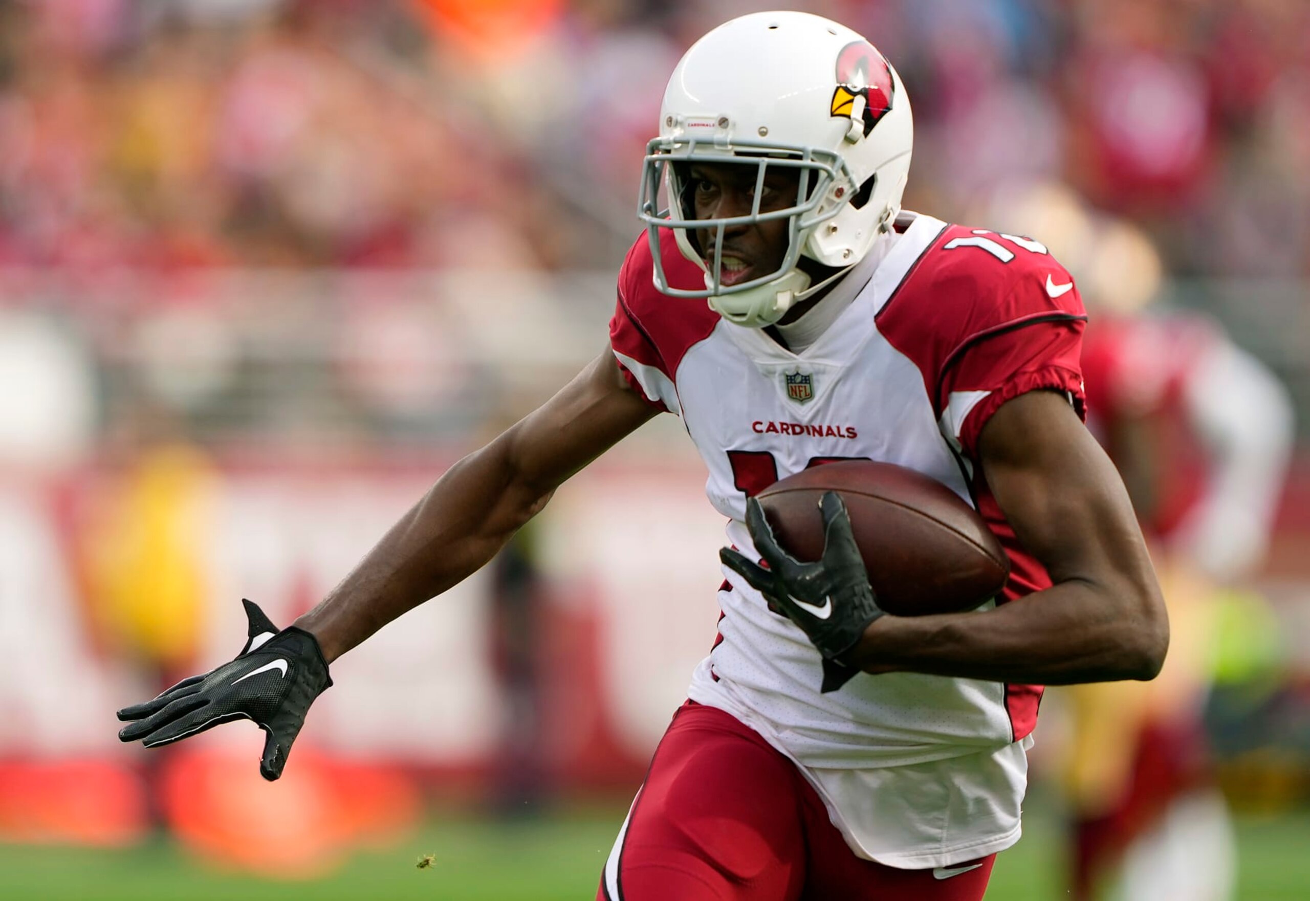 SANTA CLARA, CALIFORNIA - JANUARY 08: A.J. Green #18 of the Arizona Cardinals catches a pass and runs the ball for a touchdown during the first quarter against the San Francisco 49ers at Levi's Stadium on January 08, 2023 in Santa Clara, California. (Photo by Thearon W. Henderson/Getty Images)
