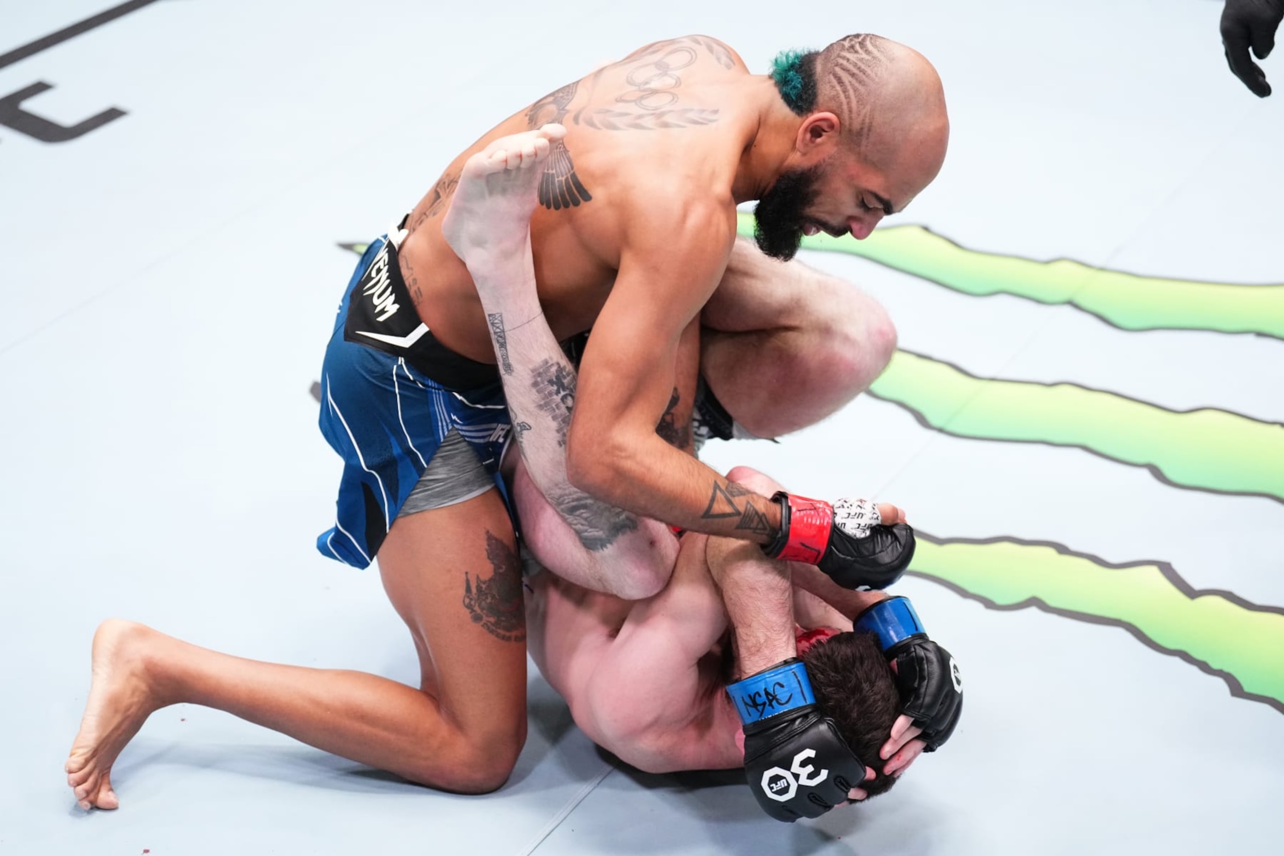 LAS VEGAS, NEVADA - JANUARY 14: (L-R) Charles Johnson punches Jimmy Flick in a flyweight fight during the UFC Fight Night event at UFC APEX on January 14, 2023 in Las Vegas, Nevada. (Photo by Chris Unger/Zuffa LLC via Getty Images)