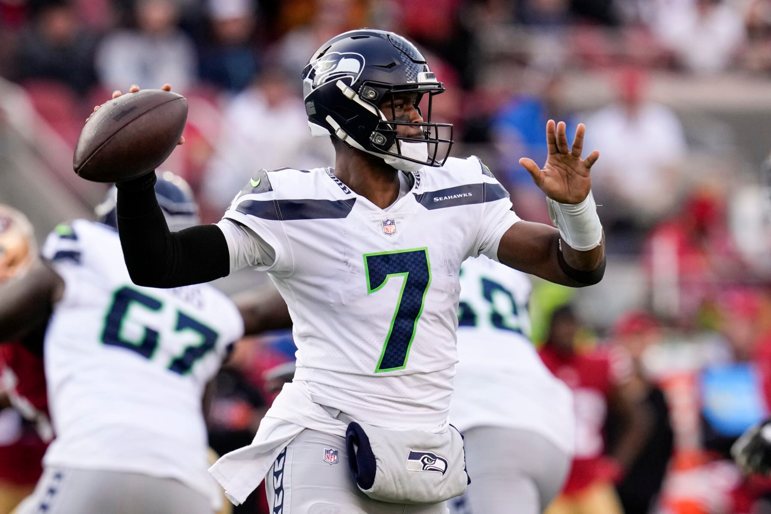 Seattle Seahawks quarterback Geno Smith (7) passes against the San Francisco 49ers during the first half of an NFL wild card playoff football game in Santa Clara, Calif., Saturday, Jan. 14, 2023. (AP Photo/Godofredo A. Vásquez)