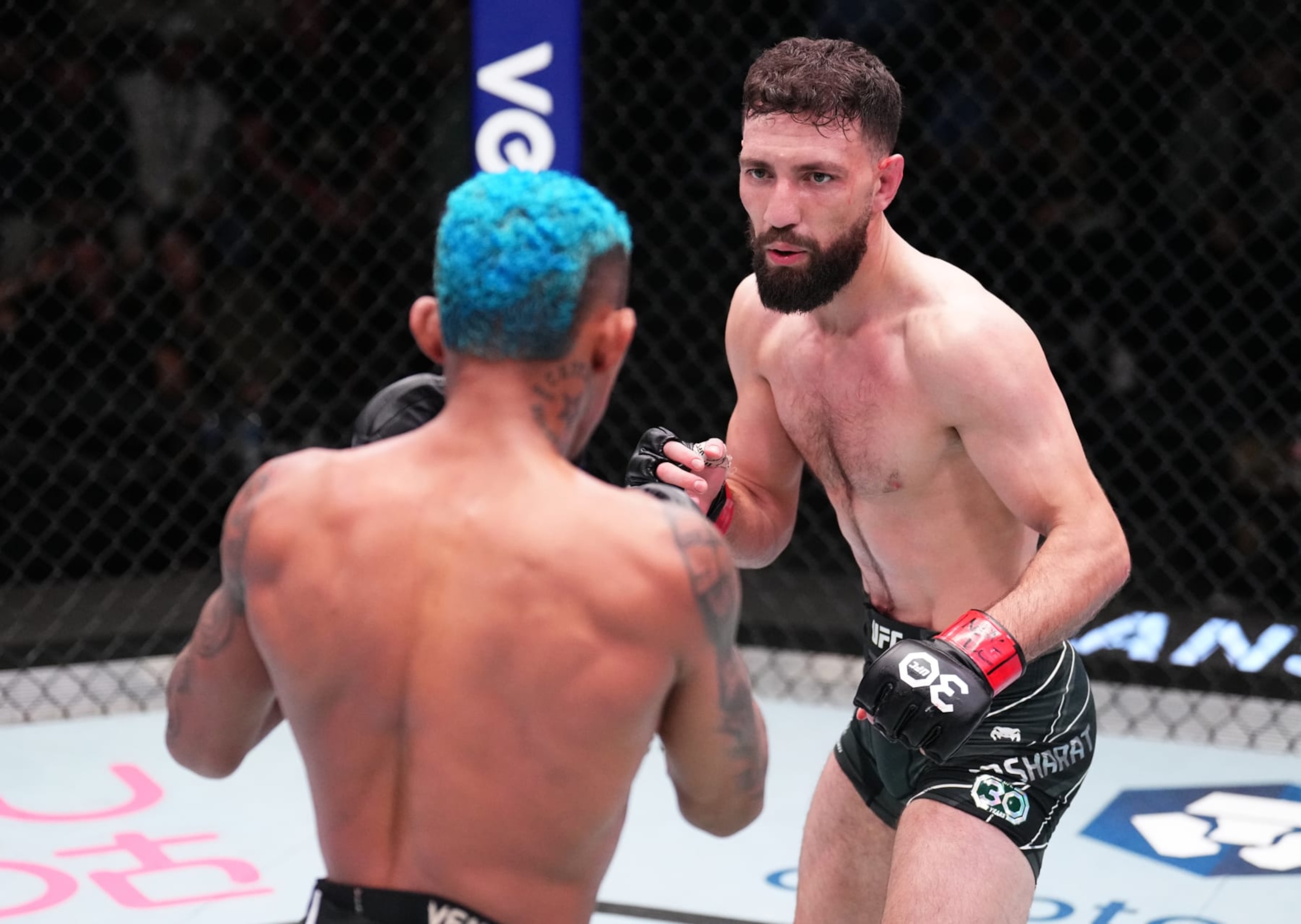 LAS VEGAS, NEVADA - JANUARY 14: (R-L) Javid Basharat of Afghanistan battles Mateus Mendonca of Brazil in a bantamweight fight during the UFC Fight Night event at UFC APEX on January 14, 2023 in Las Vegas, Nevada. (Photo by Chris Unger/Zuffa LLC via Getty Images)