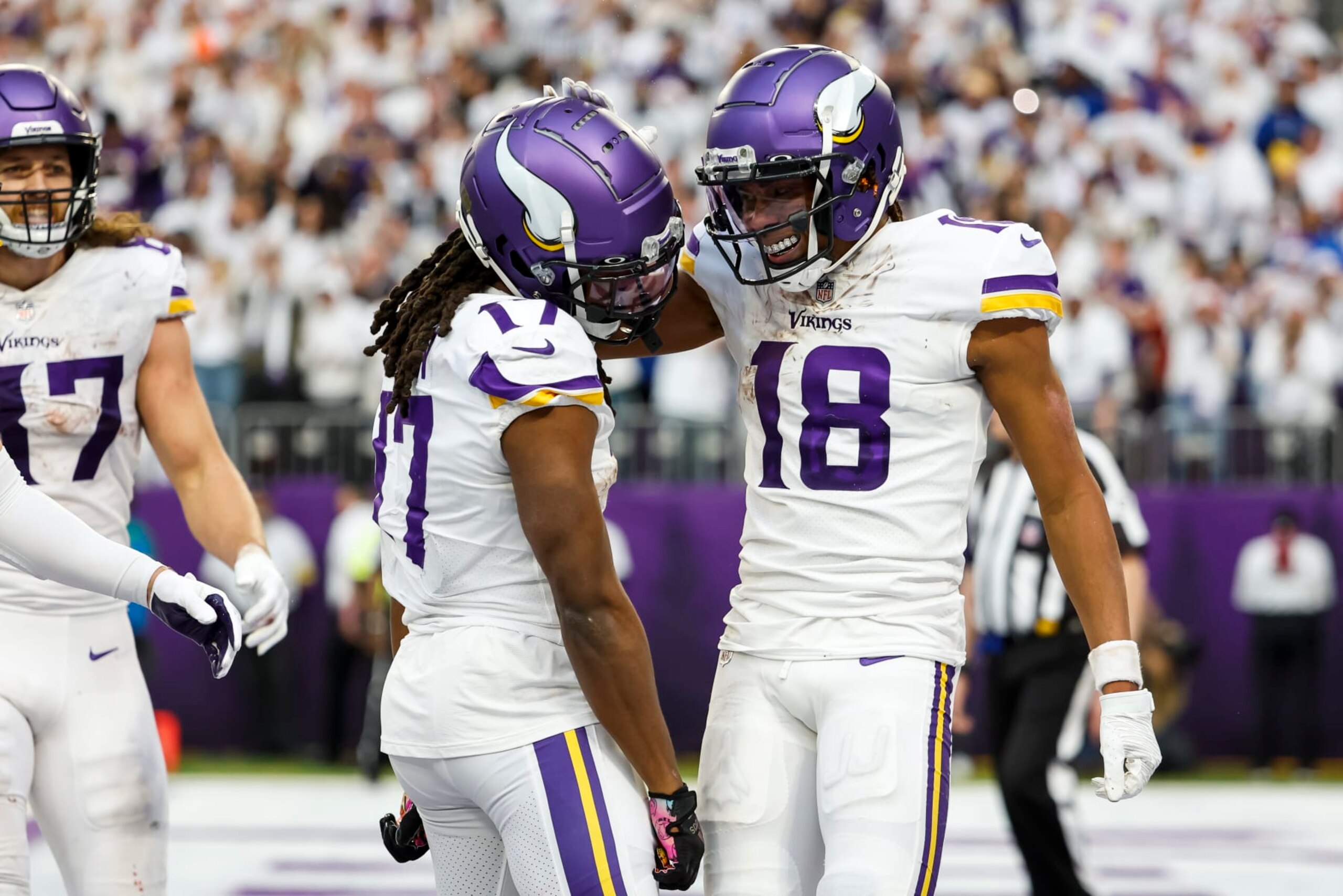 MINNEAPOLIS, MN - DECEMBER 24: Justin Jefferson #18 of the Minnesota Vikings celebrates his touchdown against the New York Giants with teammate K.J. Osborn #17 in the fourth quarter of the game at U.S. Bank Stadium on December 24, 2022 in Minneapolis, Minnesota. The Vikings defeated the Giants 27-24. (Photo by David Berding/Getty Images)