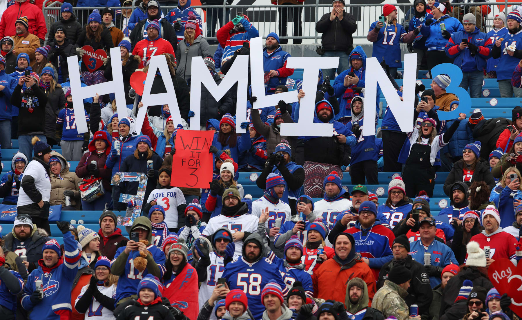 ORCHARD PARK, NY - JANUARY 08: Buffalo Bills fans hold signs in support of Buffalo Bills safety Damar Hamlin prior to the game between the Buffalo Bills and the New England Patriots at Highmark Stadium on January 8, 2023 in Orchard Park, New York. (Photo by Timothy T Ludwig/Getty Images)
