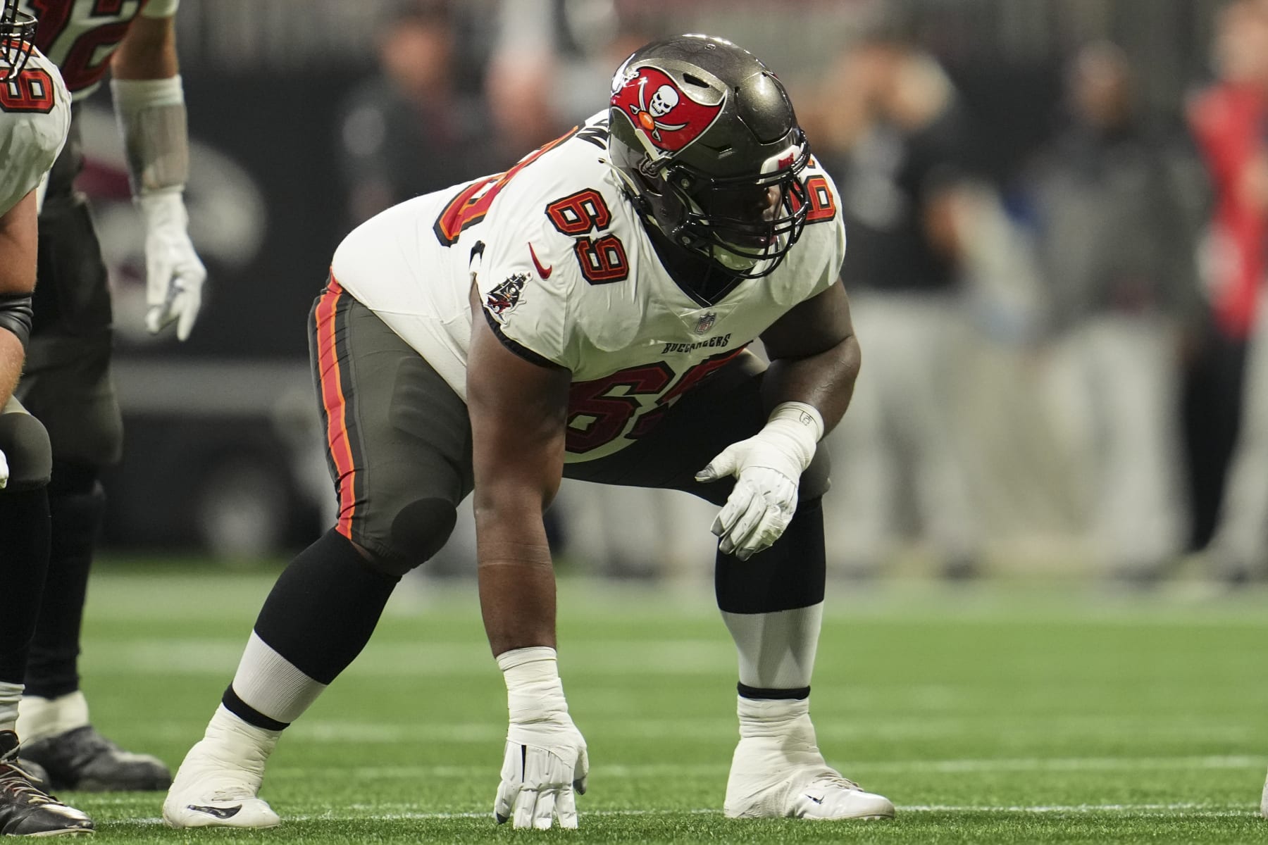 ATLANTA, GA - JANUARY 08: Shaq Mason #69 of the Tampa Bay Buccaneers gets set against the Atlanta Falcons at Mercedes-Benz Stadium on January 8, 2023 in Atlanta, Georgia. (Photo by Cooper Neill/Getty Images)