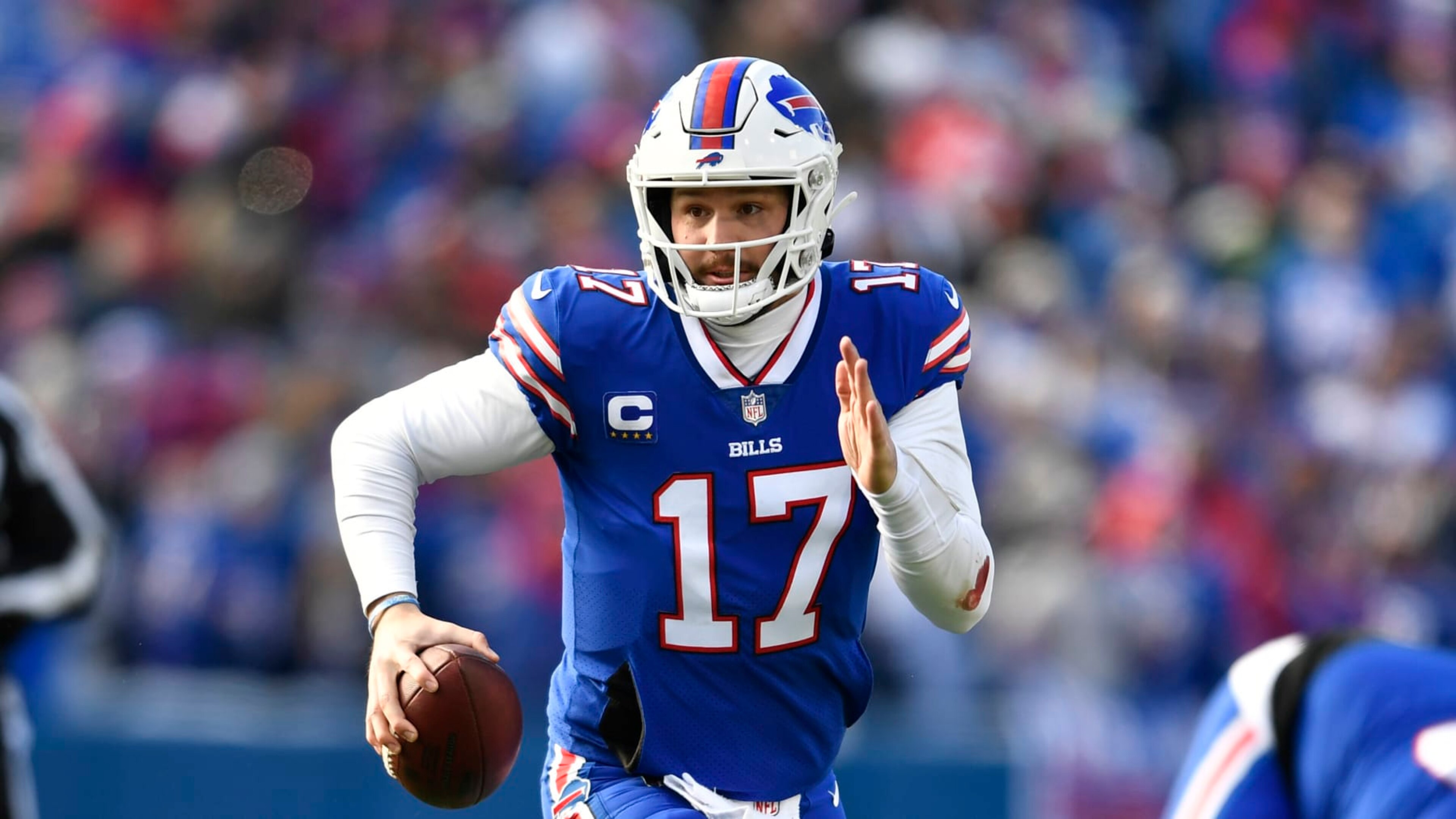 Buffalo Bills quarterback Josh Allen (17) looks to pass during the first half of an NFL wild-card playoff football game against the Miami Dolphins, Sunday, Jan. 15, 2023, in Orchard Park, N.Y. (AP Photo/Adrian Kraus)