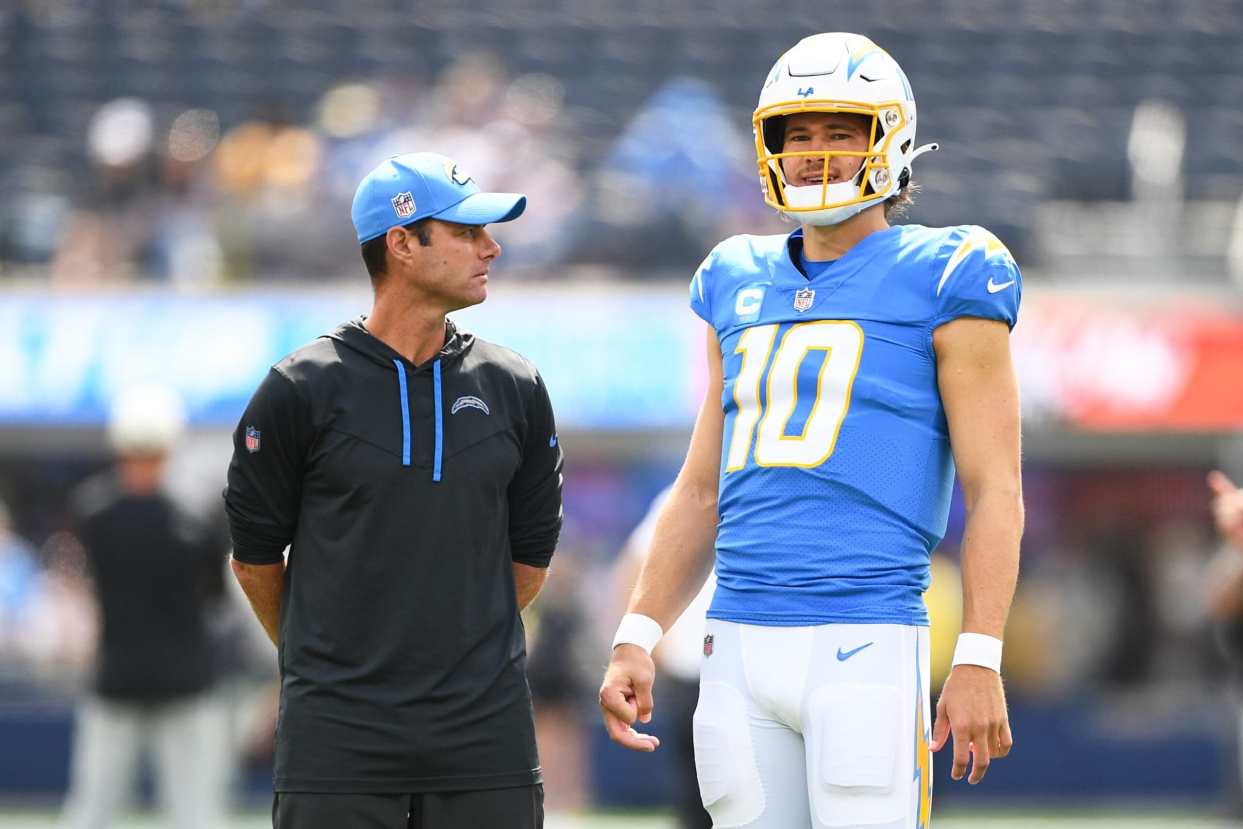 INGLEWOOD, CA - SEPTEMBER 25: Los Angeles Chargers head coach Brandon Staley looks on with quarterback Justin Herbert (10) before the NFL regular season game between the Jacksonville Jaguars and the Los Angeles Chargers on September 25, 2022, at SoFi Stadium in Inglewood, CA. (Photo by Brian Rothmuller/Icon Sportswire via Getty Images) INGLEWOOD, CA - SEPTEMBER 25: Los Angeles Chargers head coach Brandon Staley looks on with quarterback Justin Herbert (10) before the NFL regular season game between the Jacksonville Jaguars and the Los Angeles Chargers on September 25, 2022, at SoFi Stadium in Inglewood, CA. (Photo by Brian Rothmuller/Icon Sportswire via Getty Images)