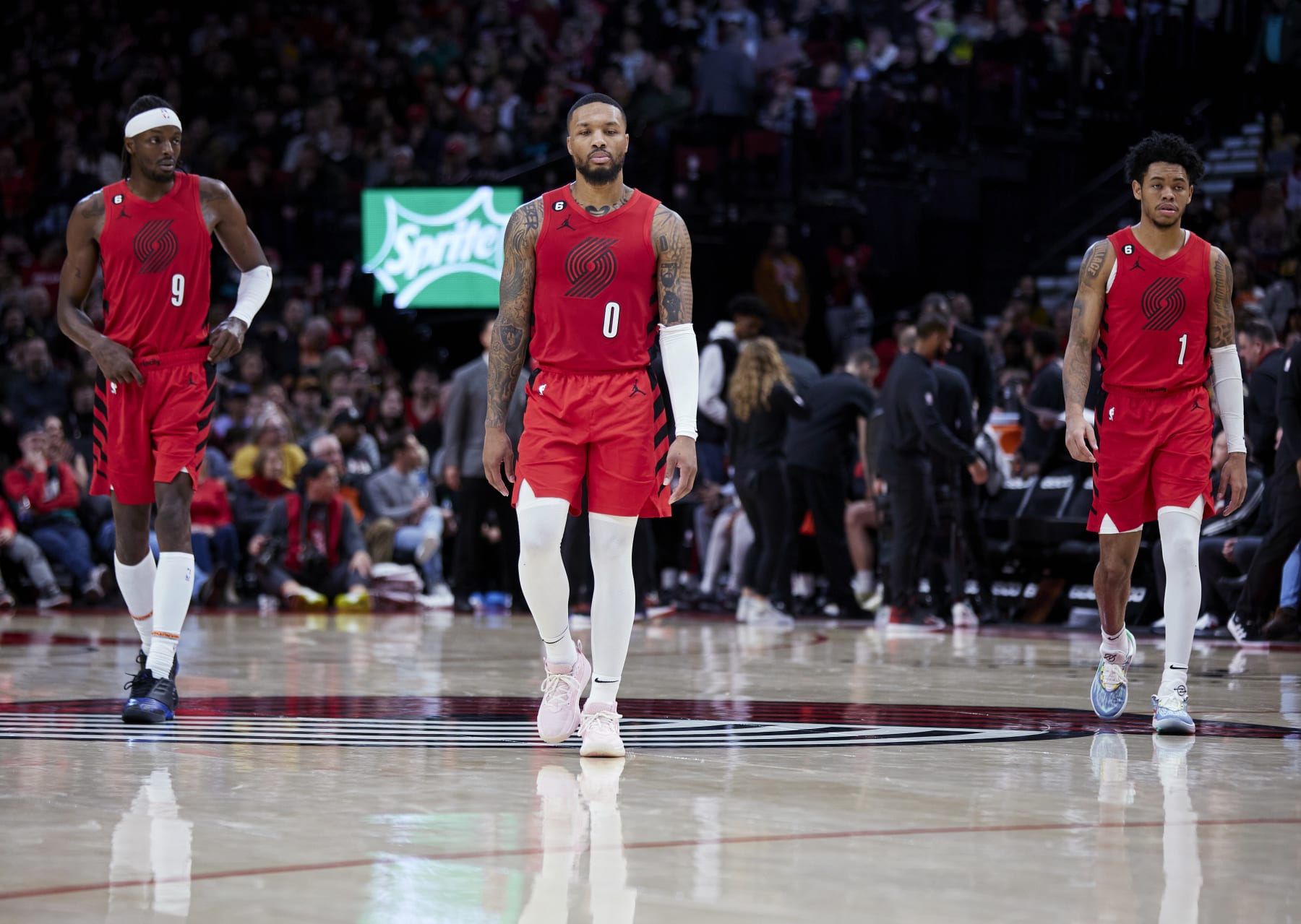 (L-R) Jerami Grant, Damian Lillard and Anfernee Simons