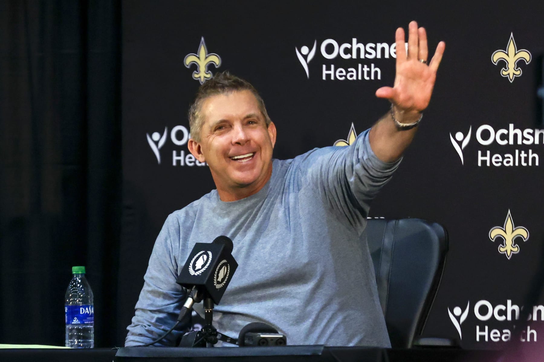 Sean Payton waves during an NFL football press conference announcing his resignation as head coach of the New Orleans Saints, Tuesday, Jan. 25, 2022, in Metairie, La. (AP Photo/Derick Hingle)