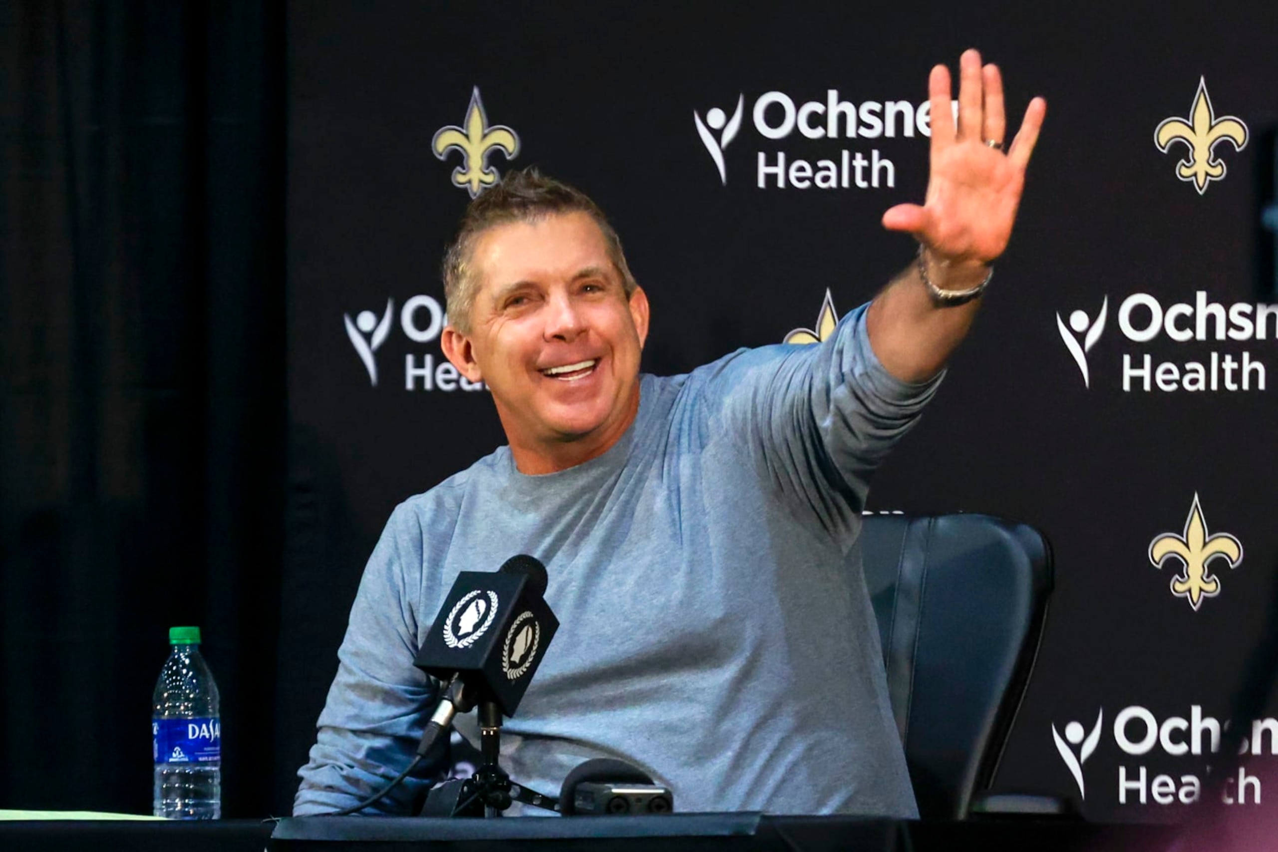 Sean Payton waves during an NFL football press conference announcing his resignation as head coach of the New Orleans Saints, Tuesday, Jan. 25, 2022, in Metairie, La. (AP Photo/Derick Hingle)