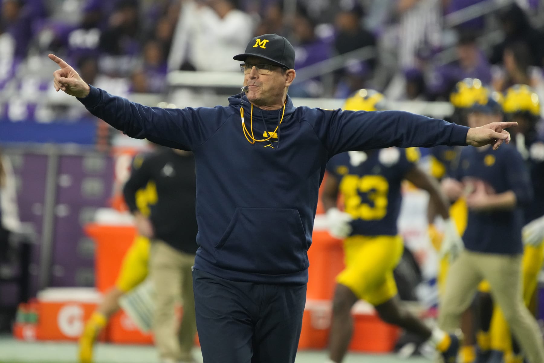 Michigan head coach Jim Harbaugh during the first half of the Fiesta Bowl NCAA college football semifinal playoff game against TCU, Saturday, Dec. 31, 2022, in Glendale, Arizona. (AP Photo/Rick Scuteri)