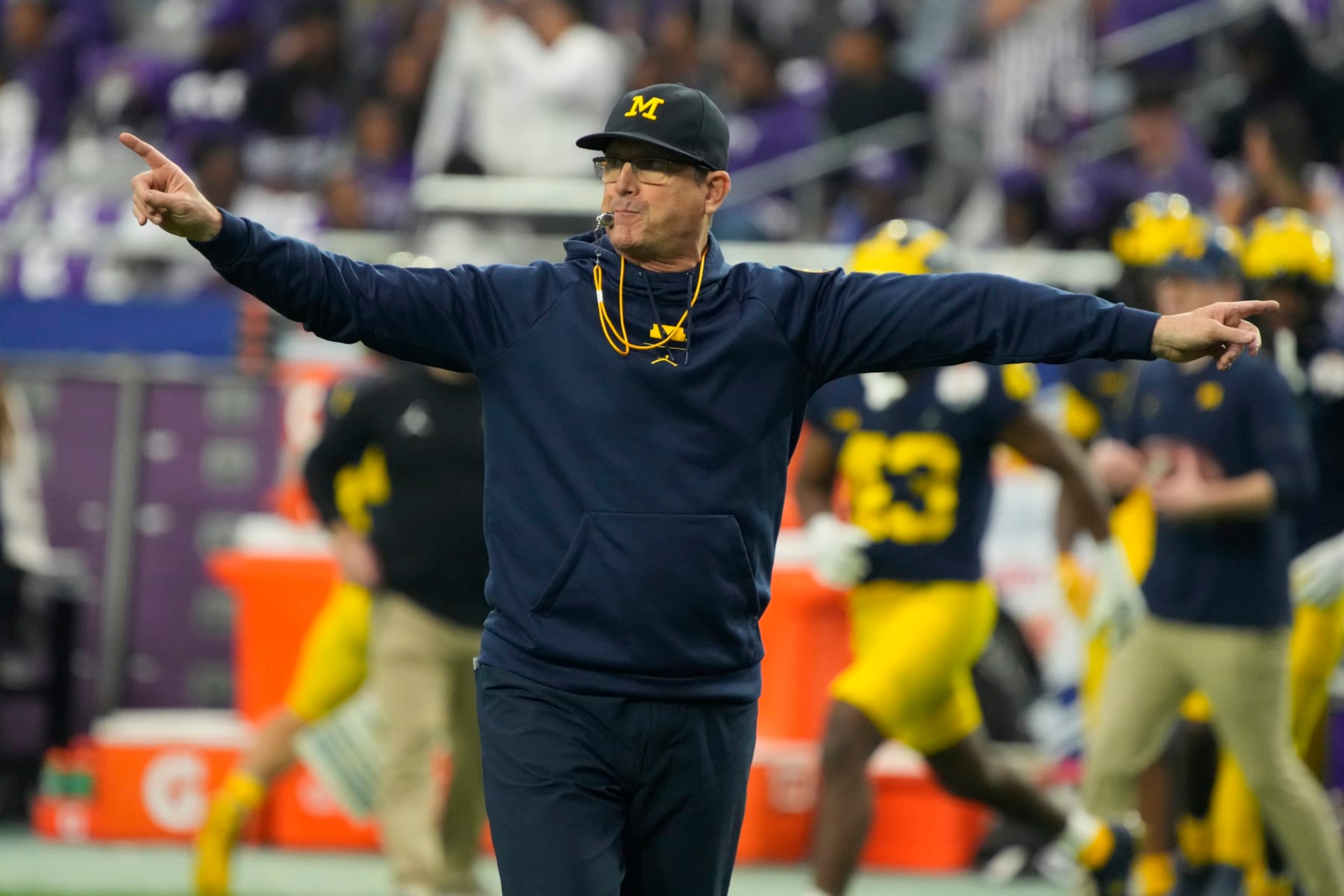 Michigan head coach Jim Harbaugh during the first half of the Fiesta Bowl NCAA college football semifinal playoff game against TCU, Saturday, Dec. 31, 2022, in Glendale, Arizona. (AP Photo/Rick Scuteri)