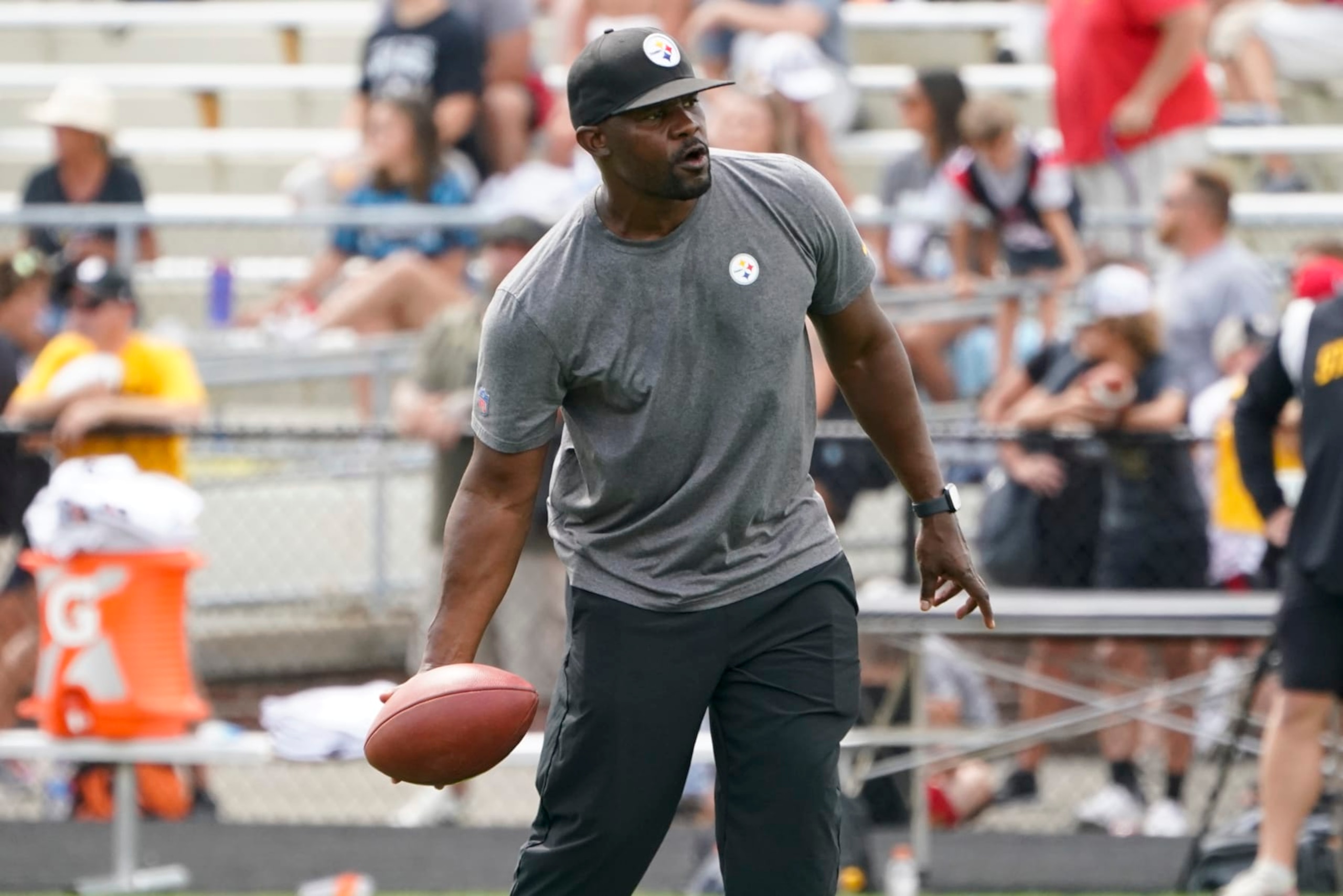 Pittsburgh Steelers senior defensive assistant Brian Flores works with the defense as they go through drills during practice at NFL football training camp in the Latrobe Memorial Stadium in Latrobe, Pa., Monday, Aug. 8, 2022. (AP Photo/Keith Srakocic)