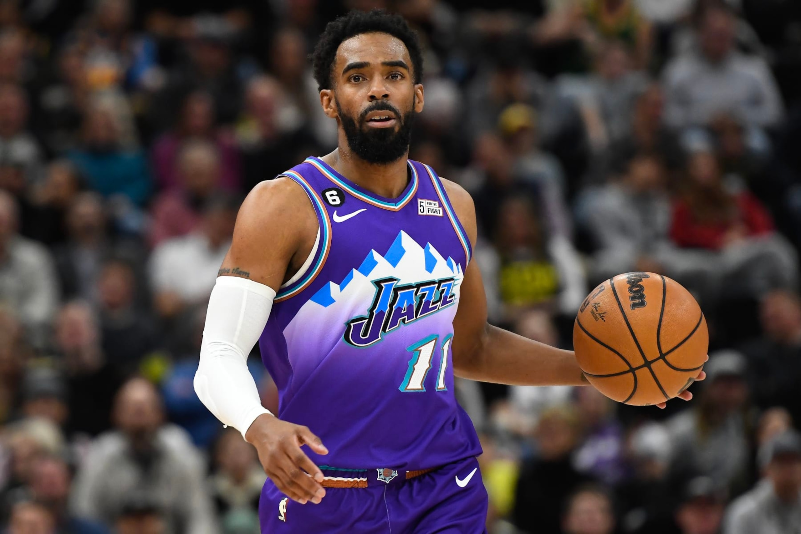 SALT LAKE CITY, UTAH - JANUARY 14: Mike Conley #11 of the Utah Jazz in action during the first half of a game against the Philadelphia 76ers at Vivint Arena on January 14, 2023 in Salt Lake City, Utah. NOTE TO USER: User expressly acknowledges and agrees that, by downloading and or using this photograph, User is consenting to the terms and conditions of the Getty Images License Agreement. (Photo by Alex Goodlett/Getty Images)
