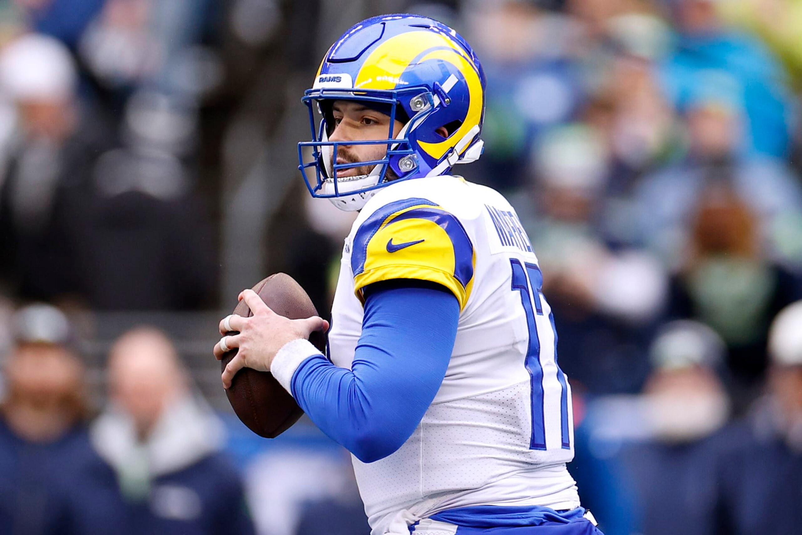 SEATTLE, WASHINGTON - JANUARY 08: Baker Mayfield #17 of the Los Angeles Rams looks to throw the ball during the first quarter against the Seattle Seahawks at Lumen Field on January 08, 2023 in Seattle, Washington. (Photo by Steph Chambers/Getty Images) SEATTLE, WASHINGTON - JANUARY 08: Baker Mayfield #17 of the Los Angeles Rams looks to throw the ball during the first quarter against the Seattle Seahawks at Lumen Field on January 08, 2023 in Seattle, Washington. (Photo by Steph Chambers/Getty Images)