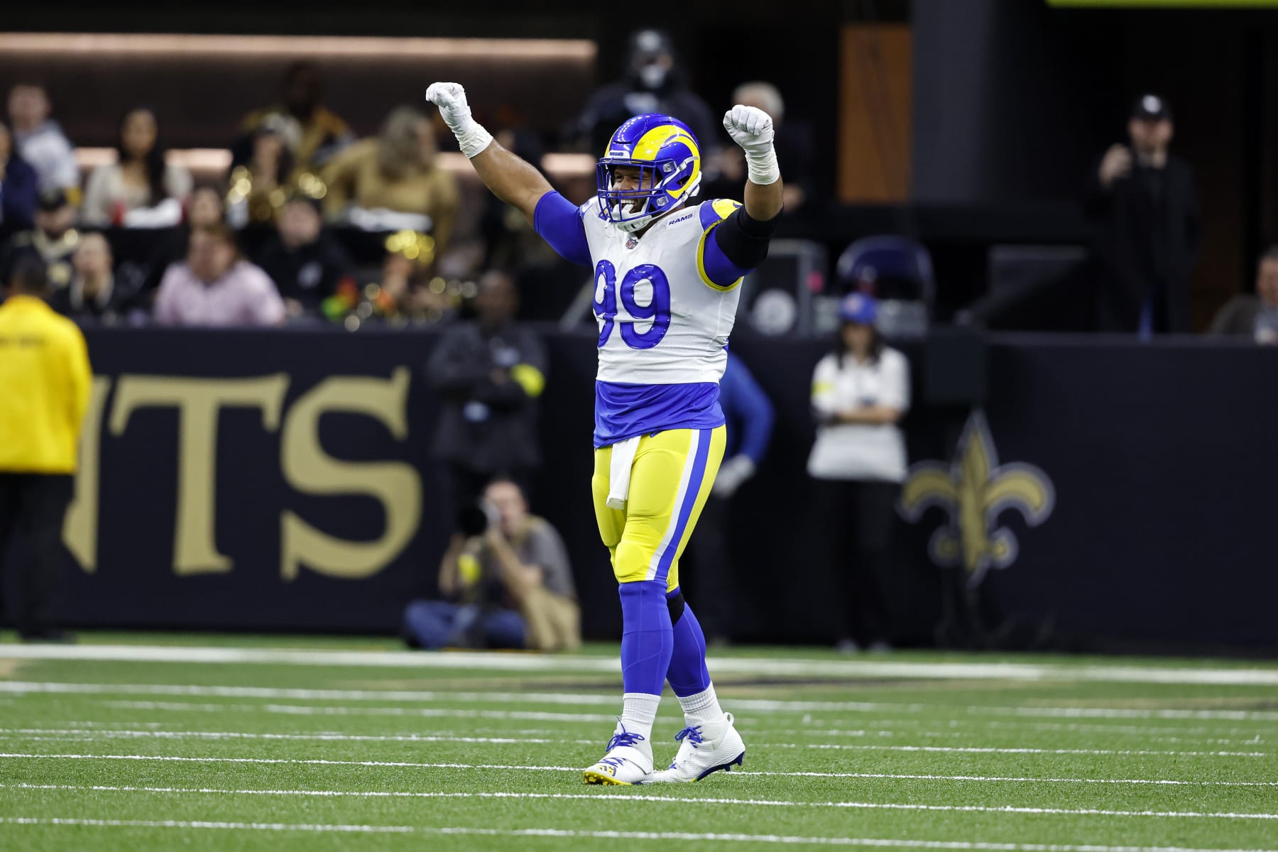 Los Angeles Rams defensive tackle Aaron Donald (99) reacts during an NFL football game against the New Orleans Saints, Sunday, Nov. 20, 2022, in New Orleans. (AP Photo/Tyler Kaufman)