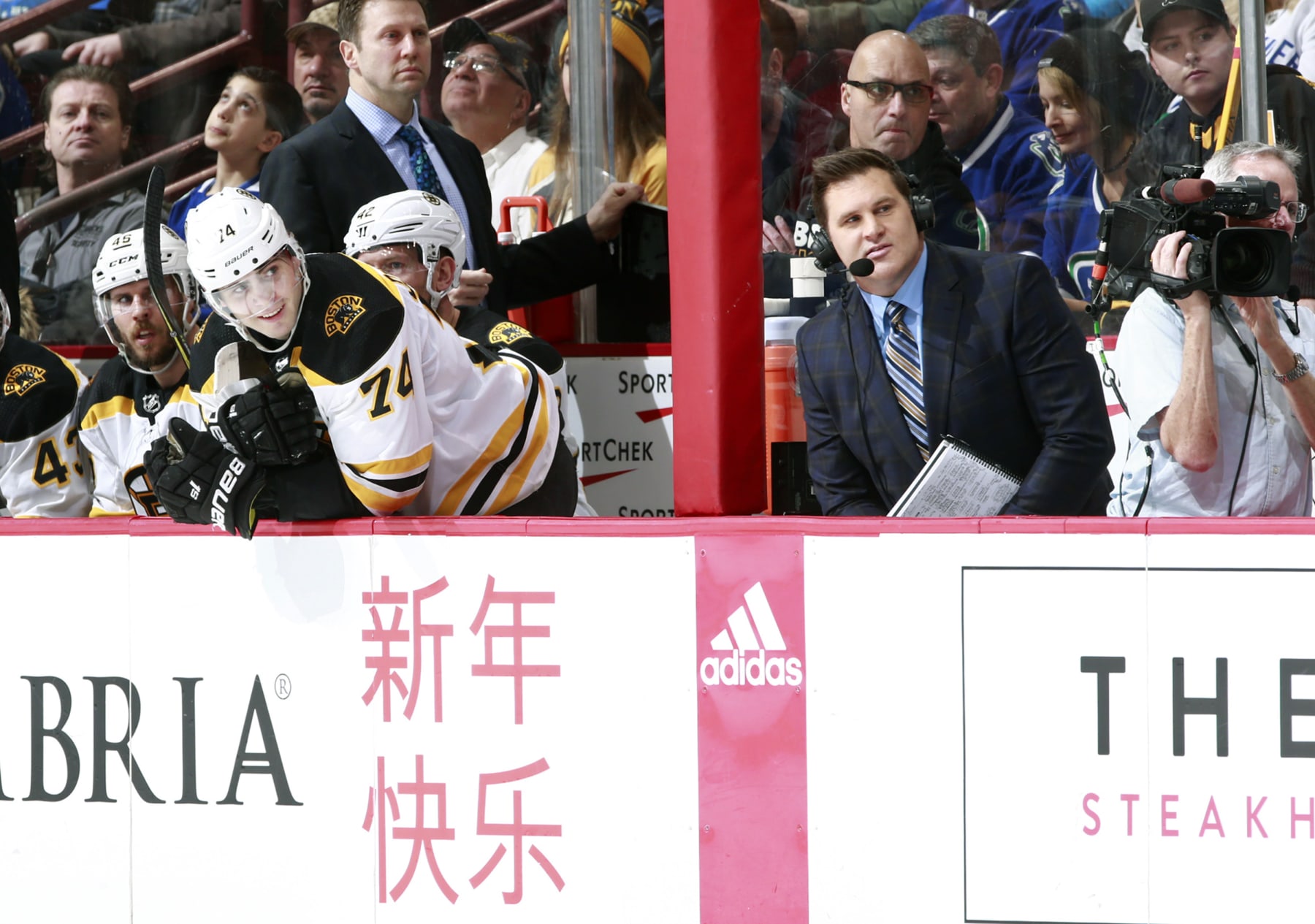 Boston Bruins winger Jake DeBrusk and his father, hockey analyst Louie DeBrusk.