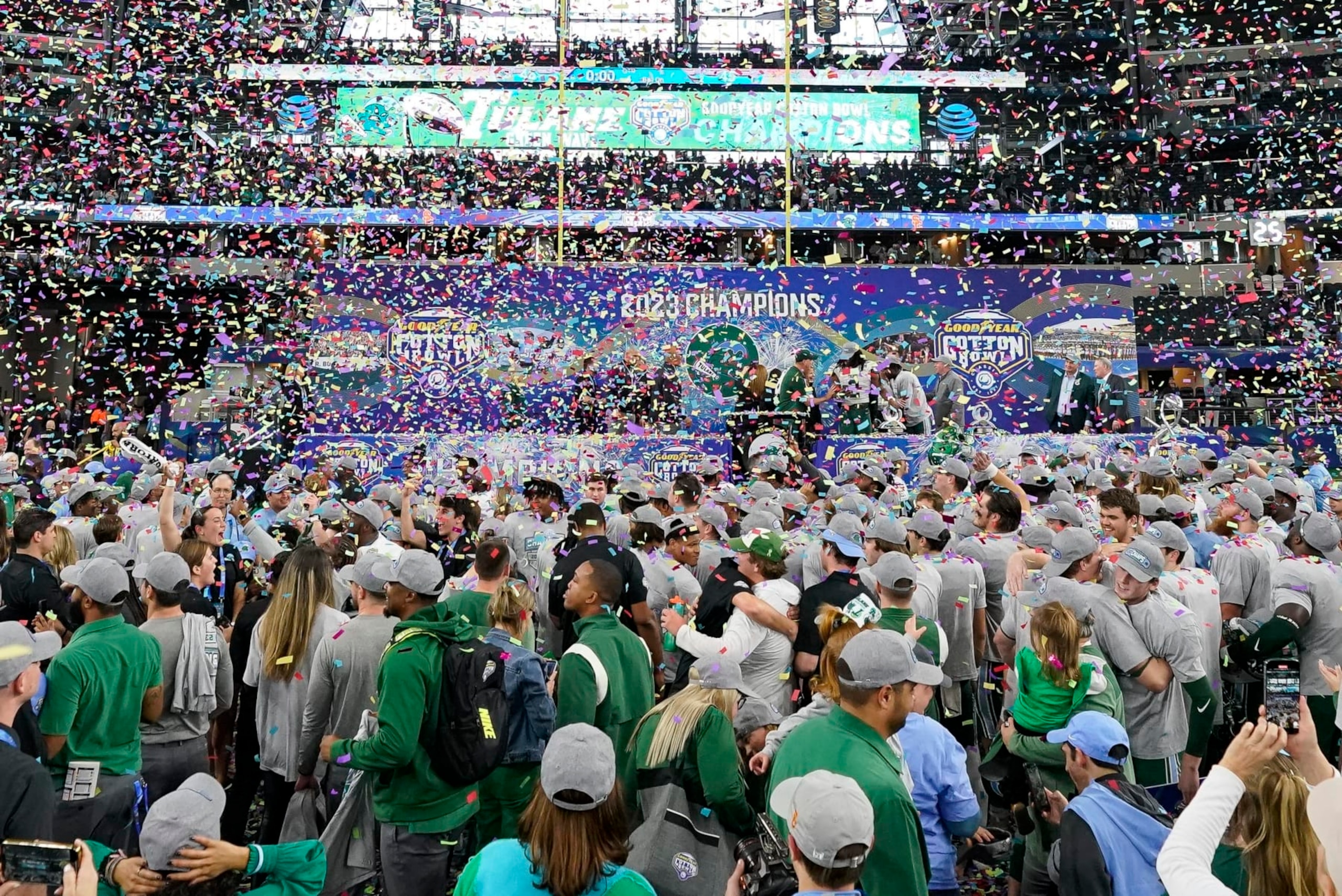 Confetti is sprayed in the air after the Cotton Bowl NCAA college football game between Southern California and Tulane, Monday, Jan. 2, 2023, in Arlington, Texas. Tulane won 46-45. (AP Photo/Sam Hodde) Confetti is sprayed in the air after the Cotton Bowl NCAA college football game between Southern California and Tulane, Monday, Jan. 2, 2023, in Arlington, Texas. Tulane won 46-45. (AP Photo/Sam Hodde)