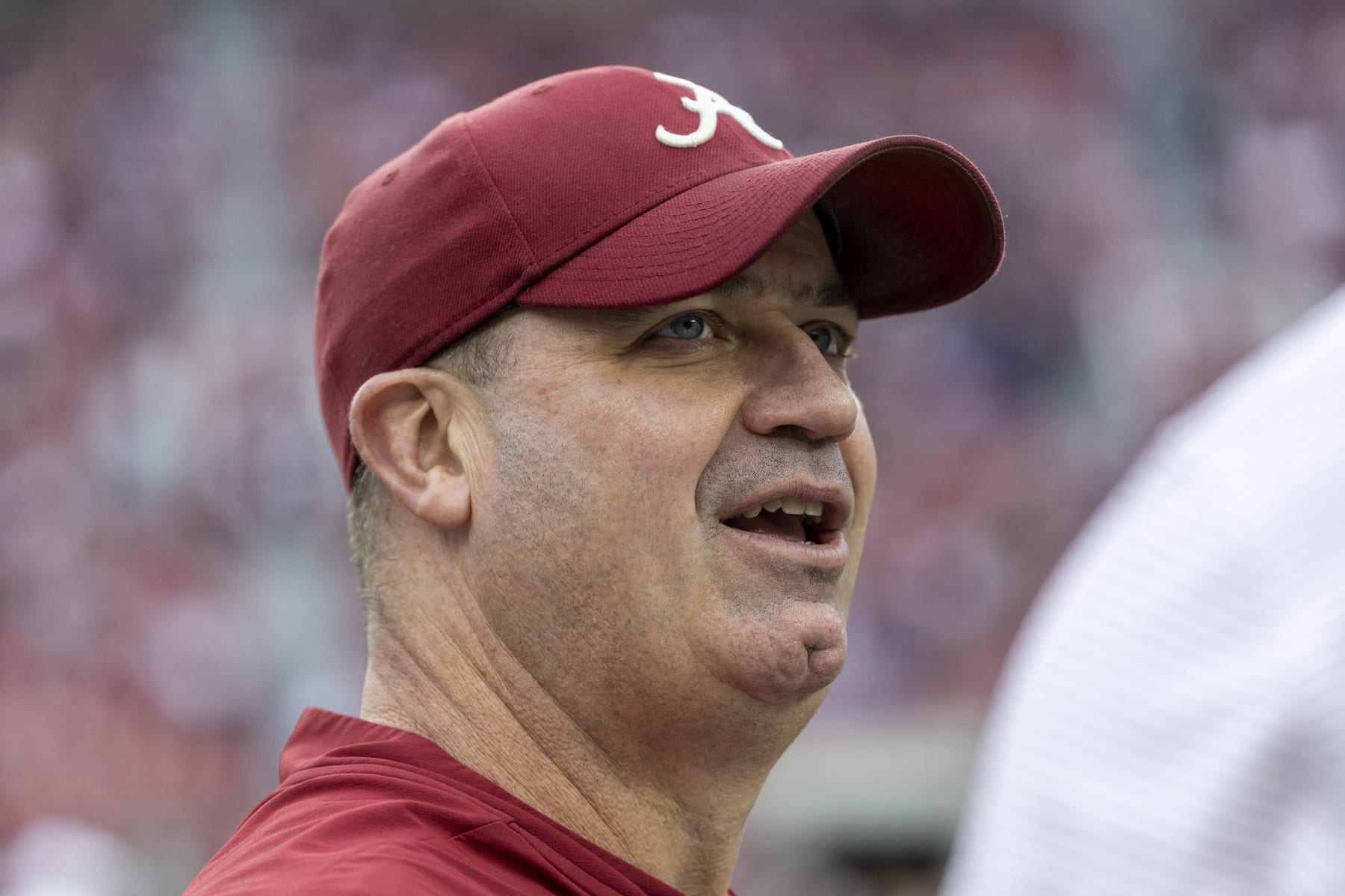 Alabama offensive coordinator Bill O'Brien talks with a bystander before an NCAA college football game against Auburn, Saturday, Nov. 26, 2022, in Tuscaloosa, Ala. (AP Photo/Vasha Hunt)