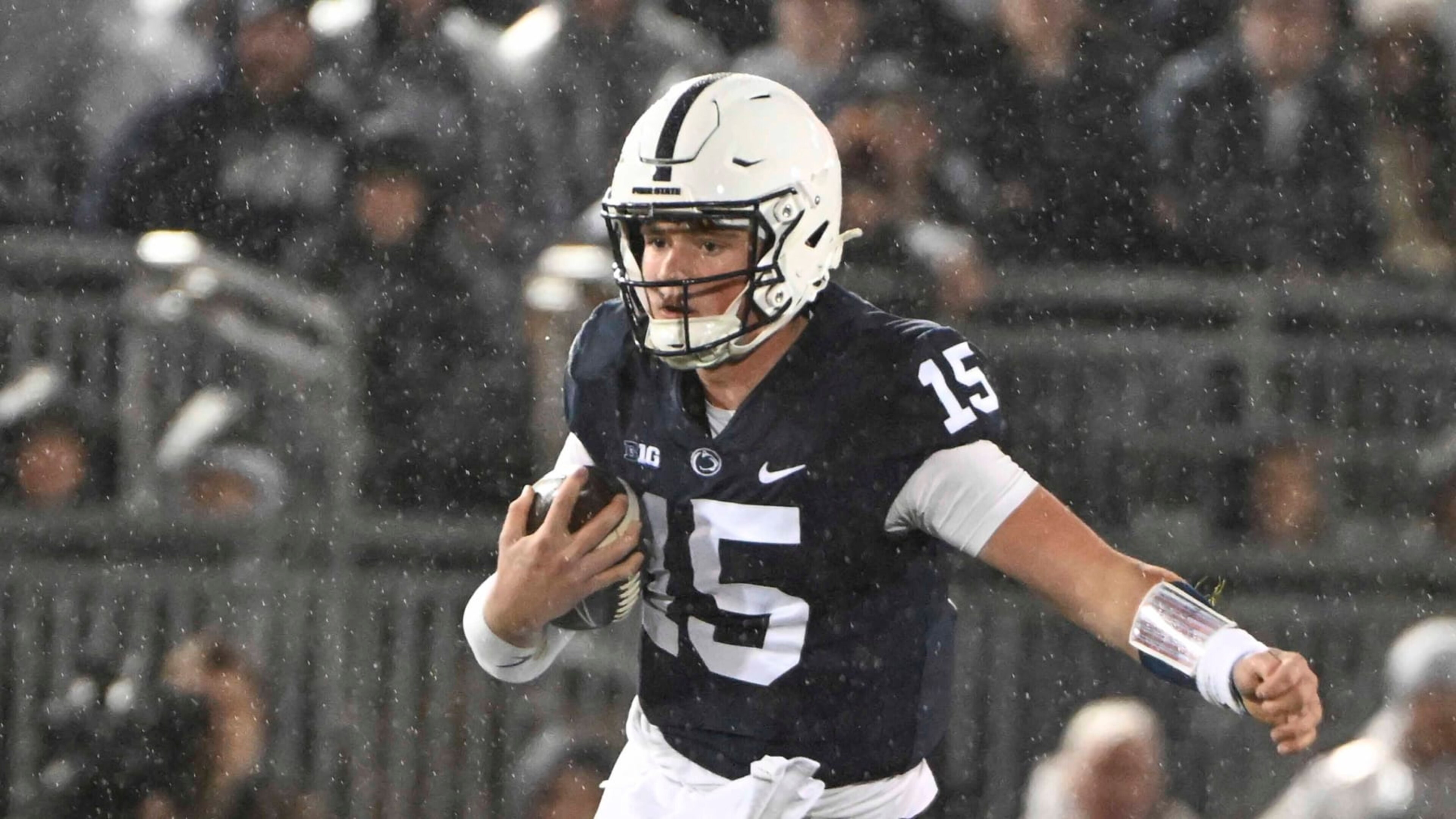 Penn State quarterback Drew Allar (15) scrambles during the second half of an NCAA college football game against Maryland, Saturday, Nov. 12, 2022, in State College, Pa. (AP Photo/Barry Reeger)