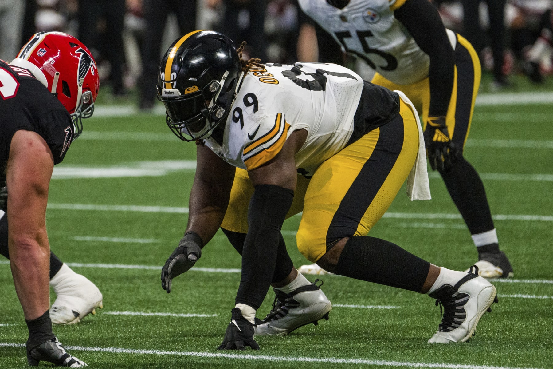 Pittsburgh Steelers defensive tackle Larry Ogunjobi (99) lines up during the first half of an NFL football game against the Atlanta Falcons, Sunday, Dec. 4, 2022, in Atlanta. The Pittsburgh Steelers won 19-16. (AP Photo/Danny Karnik)