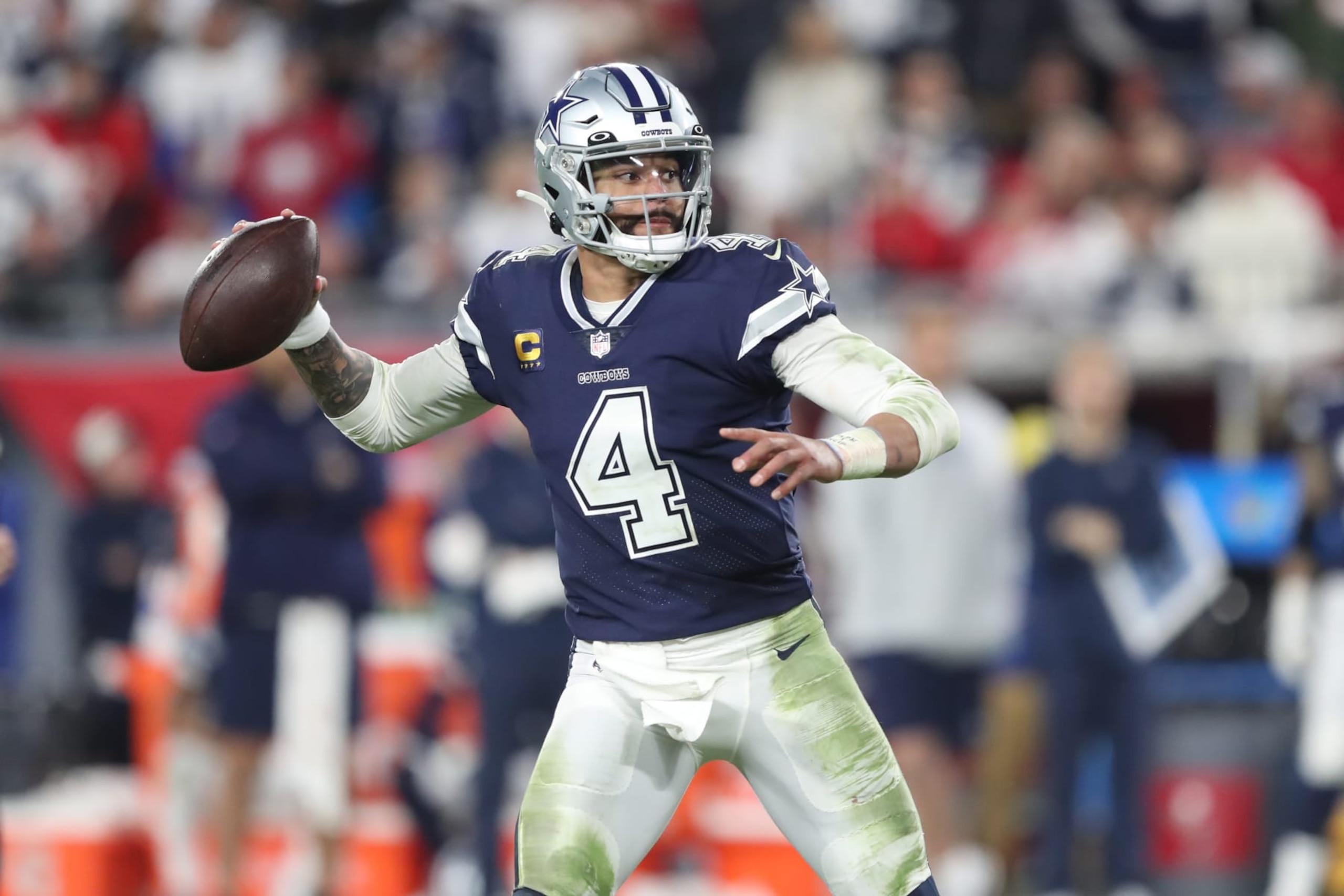 TAMPA, FL - JANUARY 16: Dallas Cowboys quarterback Dak Prescott (4) throws a pass during the NFC Wild Card Playoff game between the Dallas Cowboys and the Tampa Bay Buccaneers on January 16, 2023 at Raymond James Stadium in Tampa, Florida. (Photo by Cliff Welch/Icon Sportswire via Getty Images)
